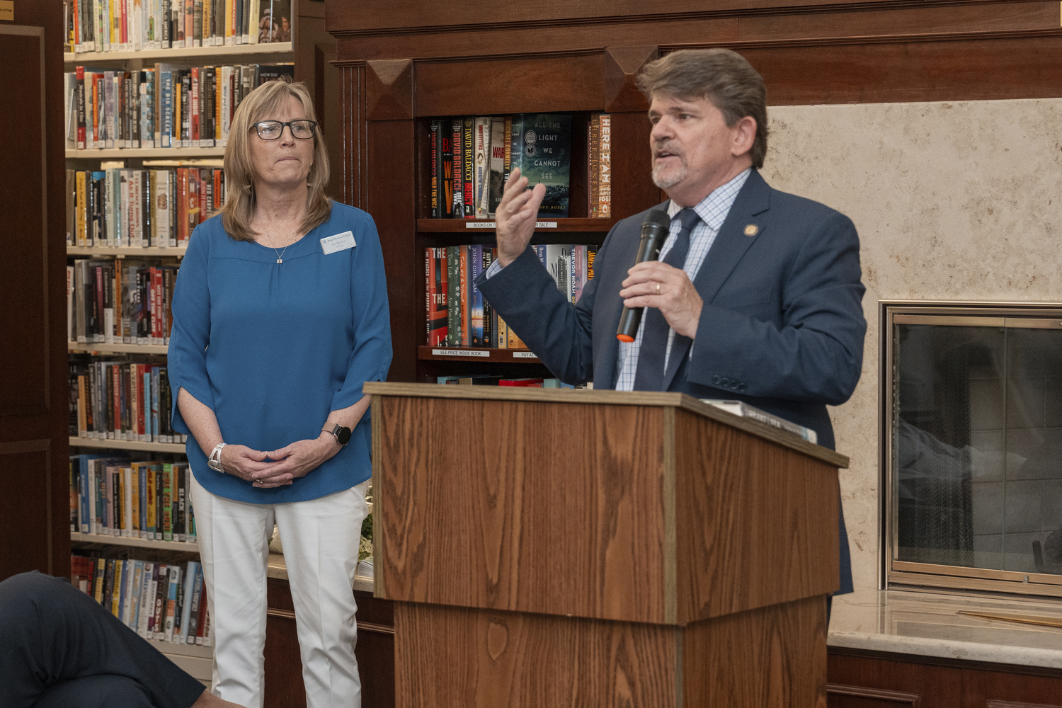 Rogers Memorial Library Director Liz Burns and State Assemblyman Tommy John Schiavoni at the library on Saturday. RON ESPOSITO