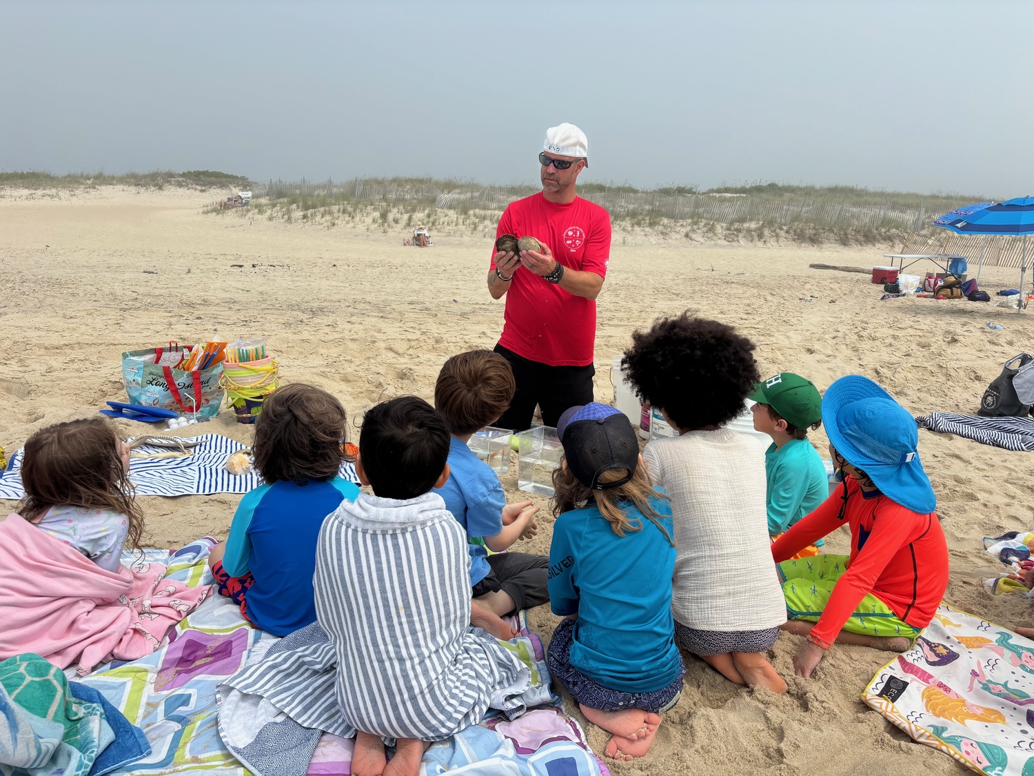 Sagaponack School students enjoyed their annual Sagg Main Beach Day last recently, where they also had a sea life lesson from  Rob “The Rockfish” Gelling from the South Fork History Museum. COURTESY SAGAPONACK SCHOOL
