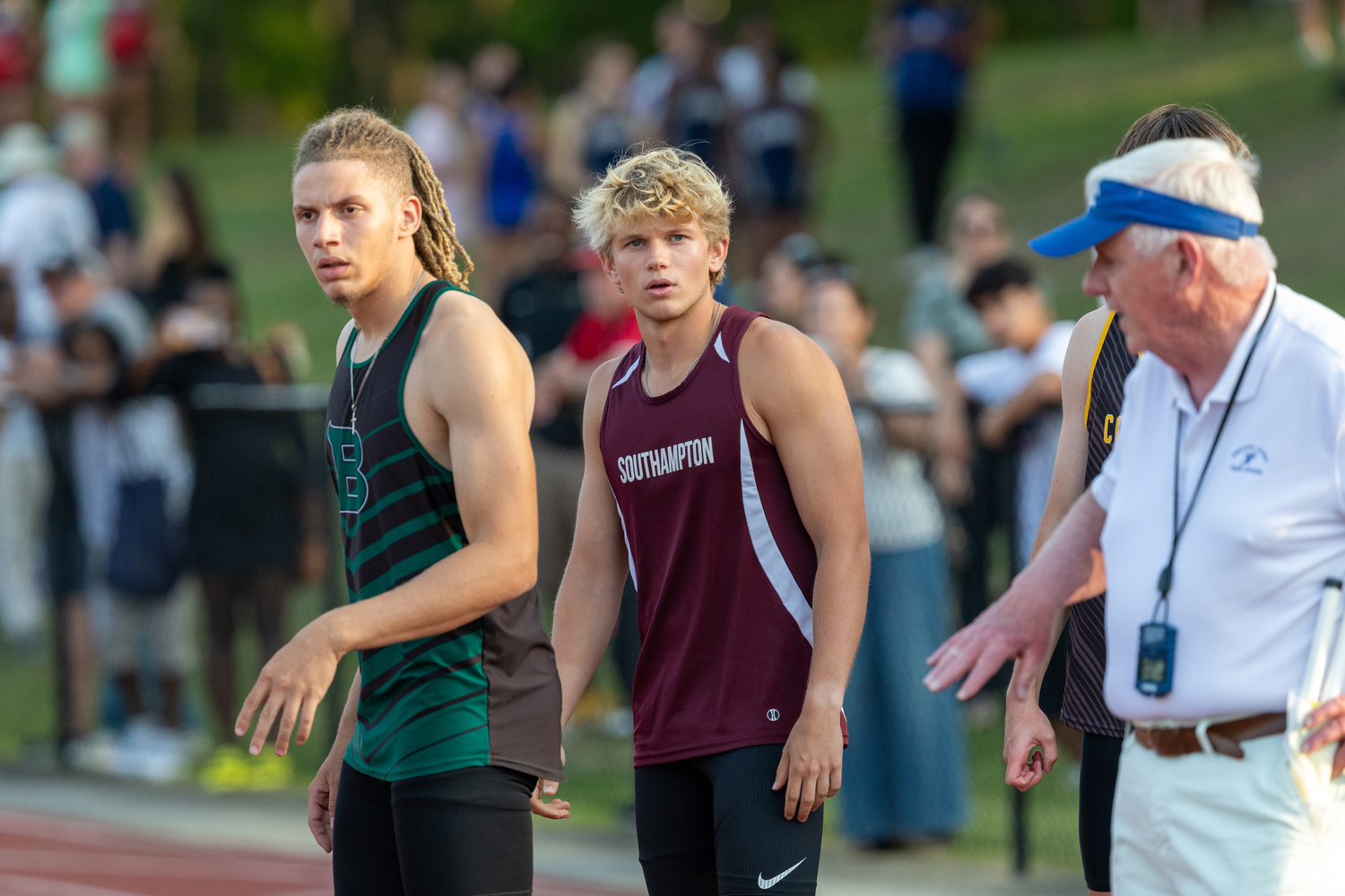 Southampton senior Christian Duggal awaits the baton in the 4x400-meter relay.  RON ESPOSITO