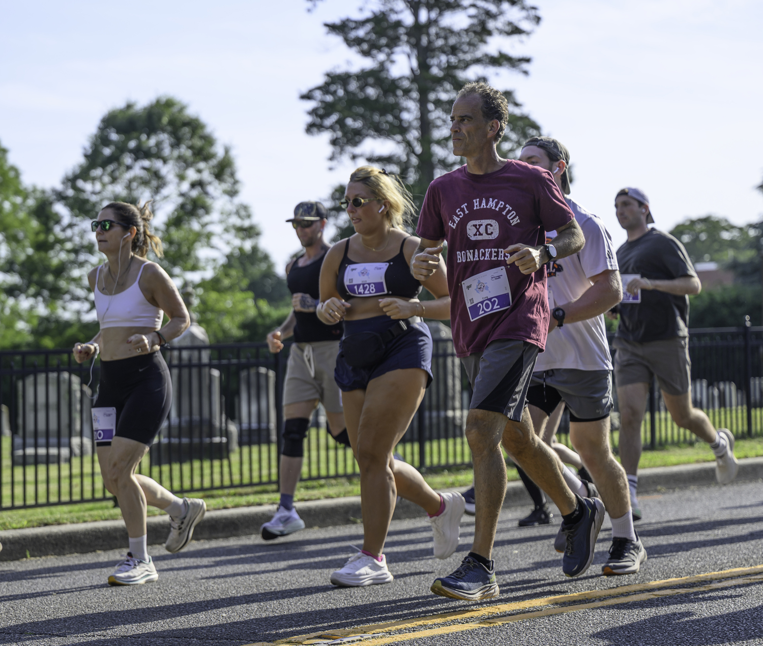 East Hampton resident, coach and lifeguard Craig Brierley at the start of Saturday's 10K.  MARIANNE BARNETT