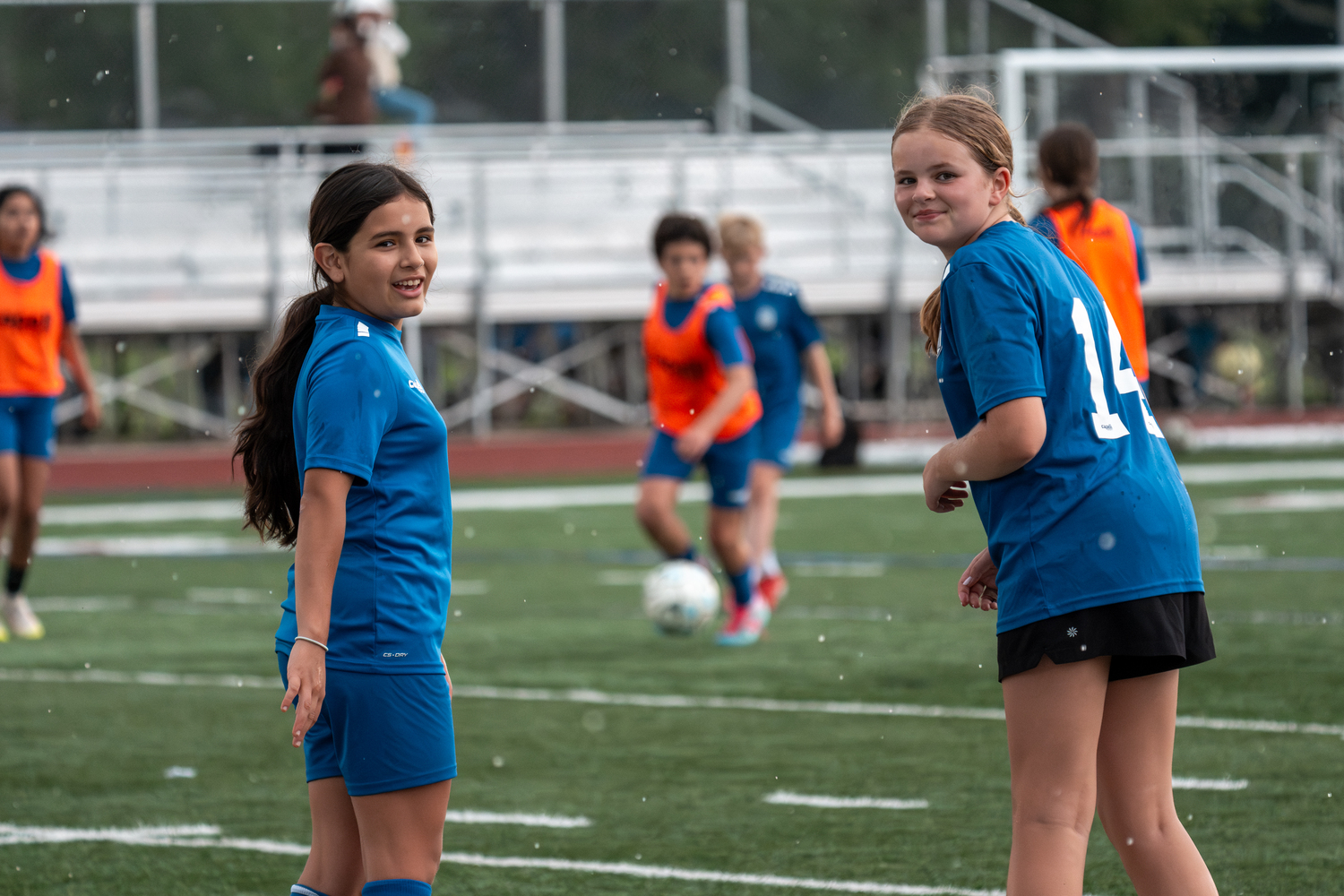 Southampton Town United players, parents and coaches gathered at Southampton High School on Friday night for the club's annual soccer festival. The club includes players from age 3 to 18, and had 26 travel teams compete in the Long Island Junior Soccer League this spring. The festival's main event, a game on the turf featuring the oldest club team, with players born in 2007, against coaches in the club, was named in honor of former coach Sean Collins this year. Collins died on May 2 after a battle with cancer. RON ESPOSITO