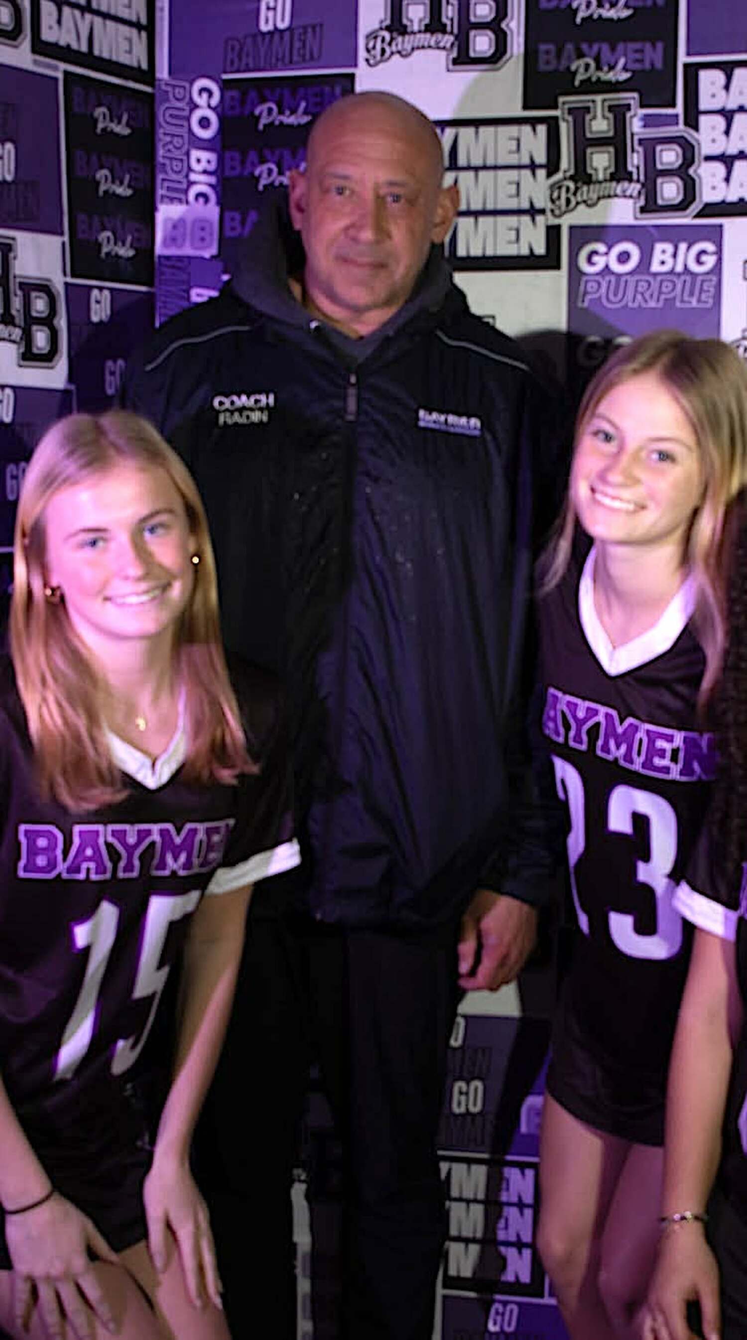 Juniors Taylor Meyers and Eden Brown with head coach Jules Radin on Media Day. COURTESY HAMPTON BAYS ATHLETICS
