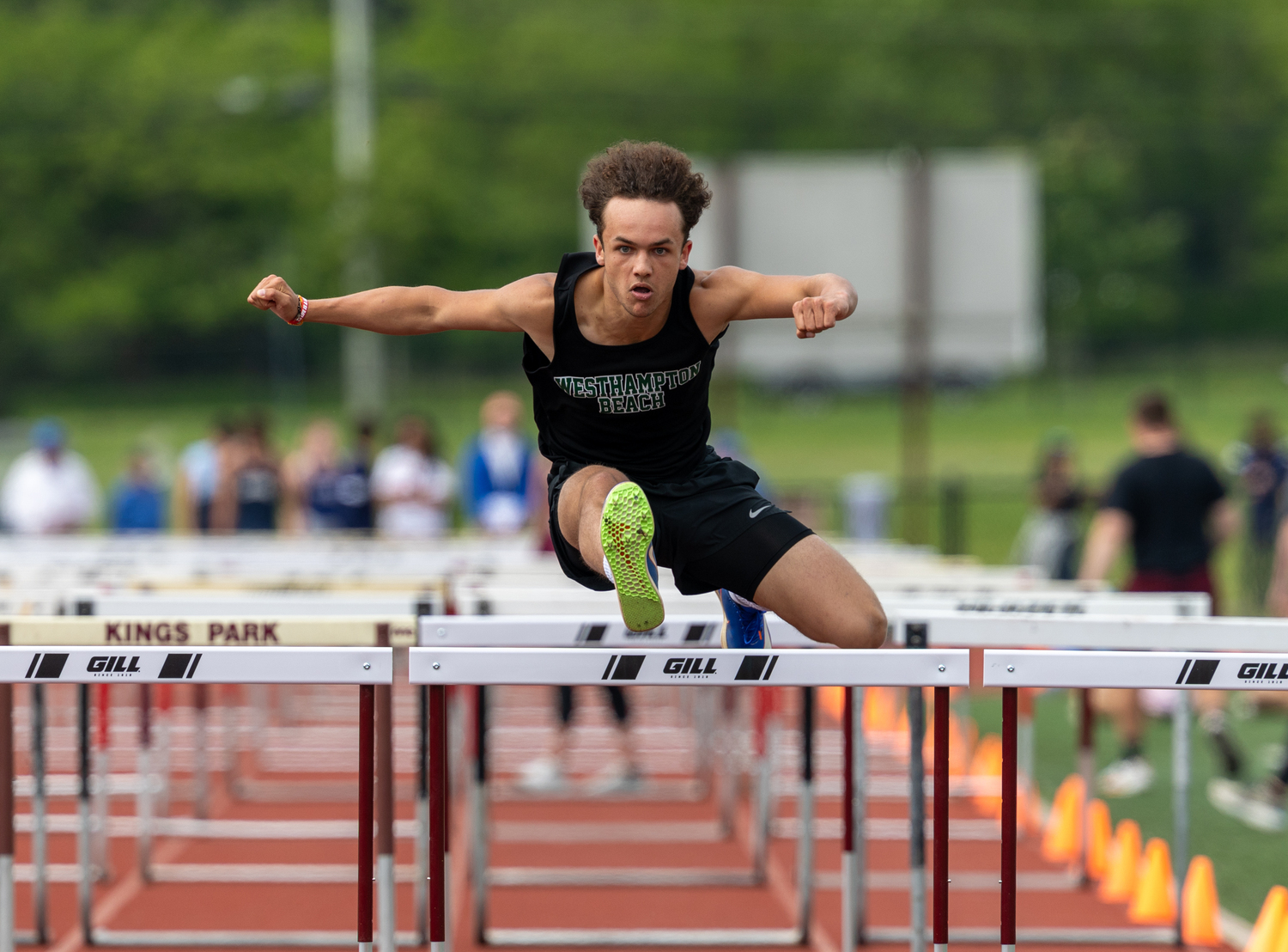 Ezekial McCrary in the 100-meter hurdles of the pentathlon.   RON ESPOSITO