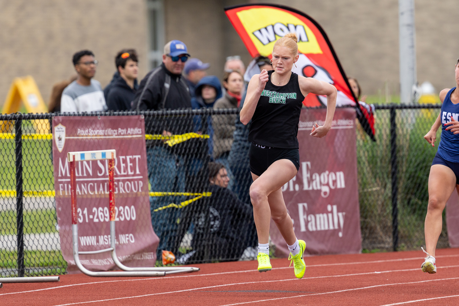 Westhampton Beach junior Mia Hill in the 200-meter dash.  RON ESPOSITO