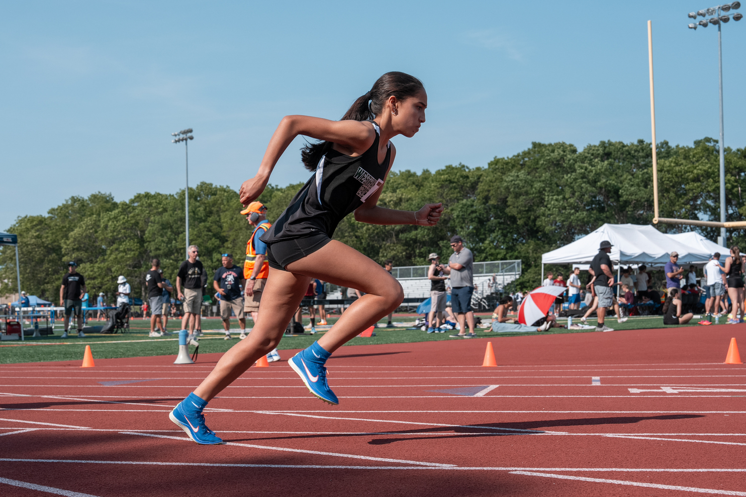 Westhampton Beach sophomore Jasmine Garcia Barrientos at the start of the 800-meter race.  RON ESPOSITO
