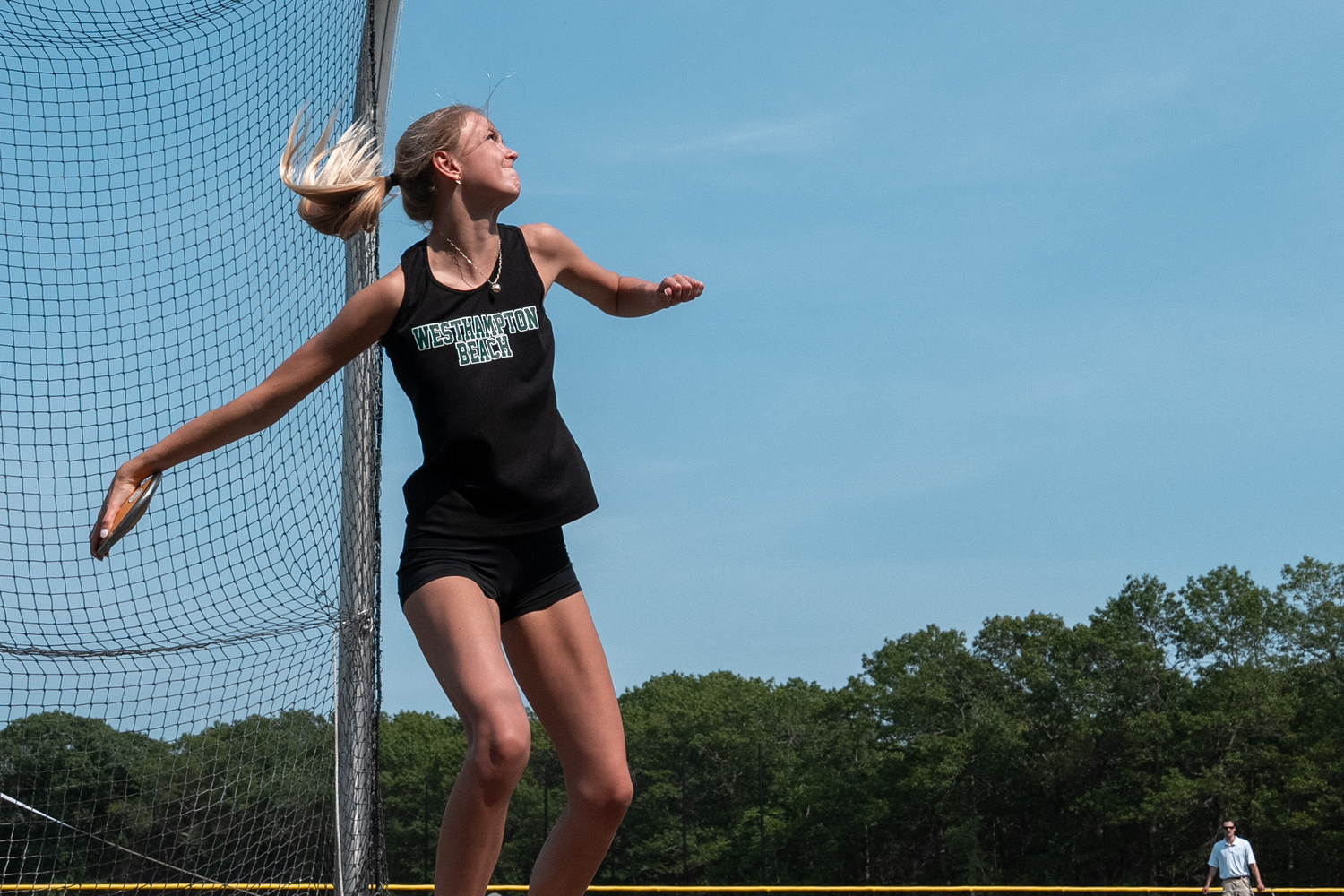 Westhampton Beach senior Lucy Mansfield in the discus.   RON ESPOSITO