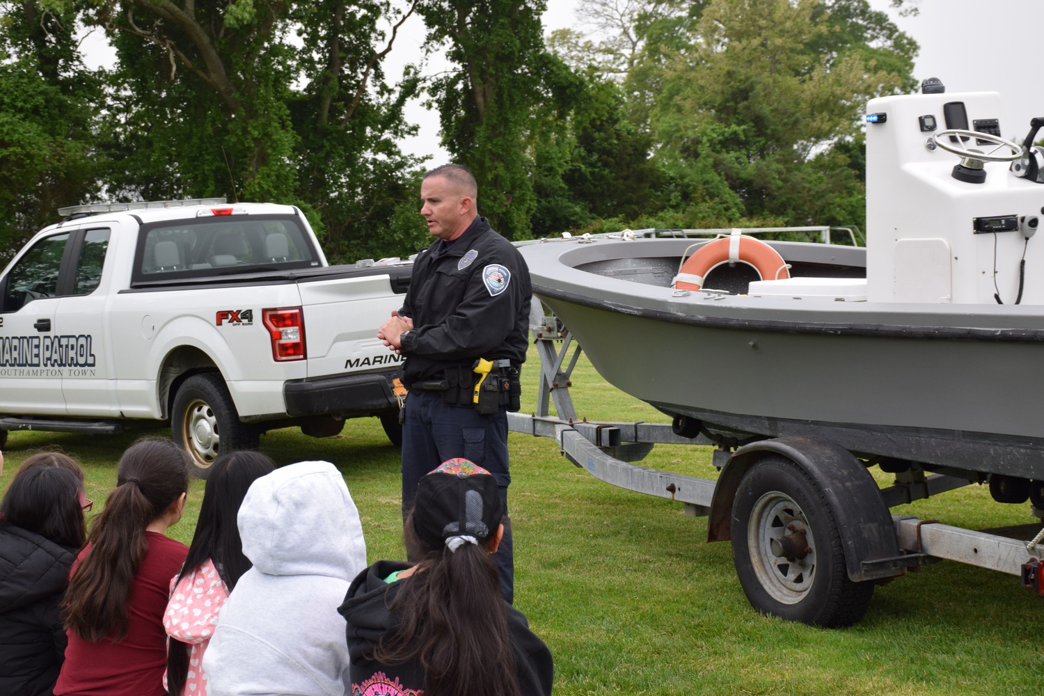 Westhampton Beach Elementary School students recently celebrated Police Day, during which local law enforcement officers spoke to them about different jobs and technologies in the field. The students learned about the SWAT team, K-9 unit, helicopter unit and police drones. COURTESY WESTHAMPTON BEACH SCHOOL DISTRICT