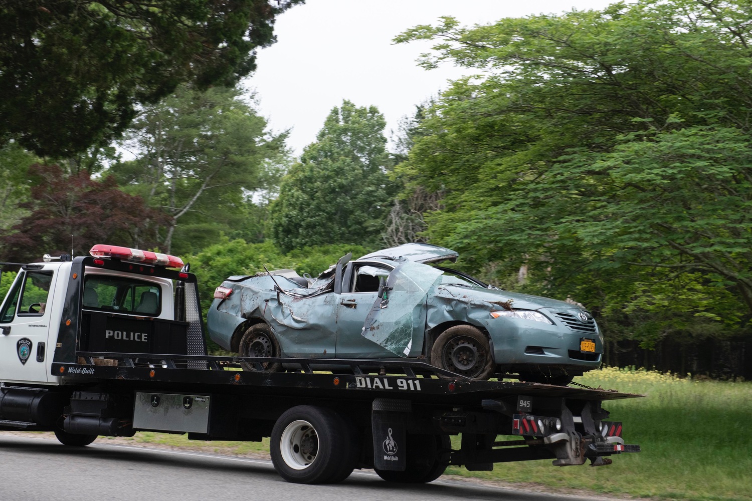 The vehicle involved in the fatal crash being removed from the scene on Monday morning. DOUG KUNTZ
