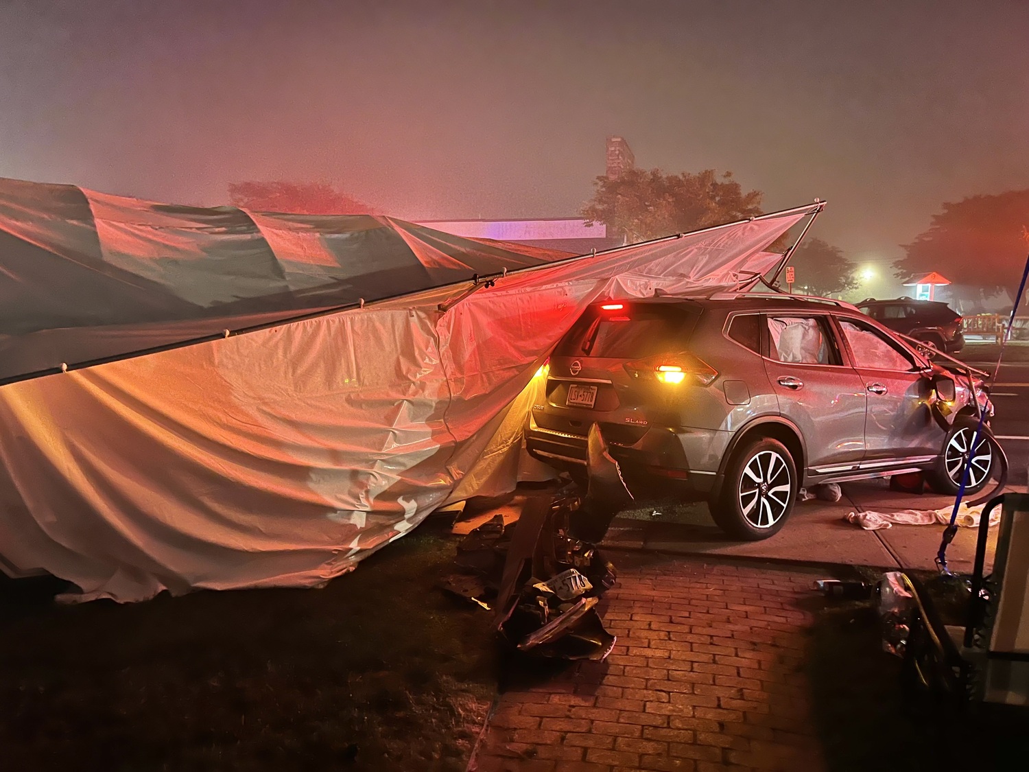 The vehicle crashed through six tents at the Montauk Artists Association art fair on the Montauk Green. JOHN PAPALEO