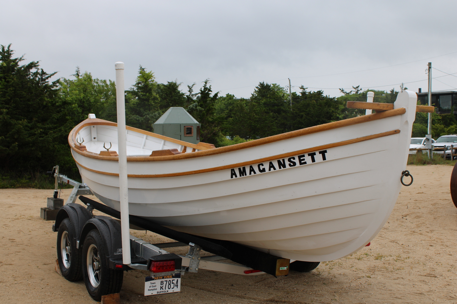After a few years of work, carpenter Robert Staab delivered a replica Beebe-McClellan surfboat to the Amagansett Life-Saving Station last fall. On Saturday, June 14, the Board of Trustees for the station held a christening ceremony. JACK MOTZ