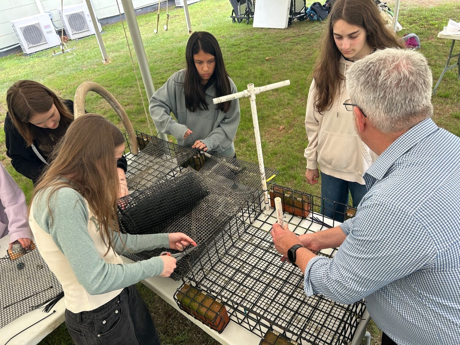Shelter Island School District students working on seahorse hotels. COURTESY CORNELL COOPERATIVE EXTENSION