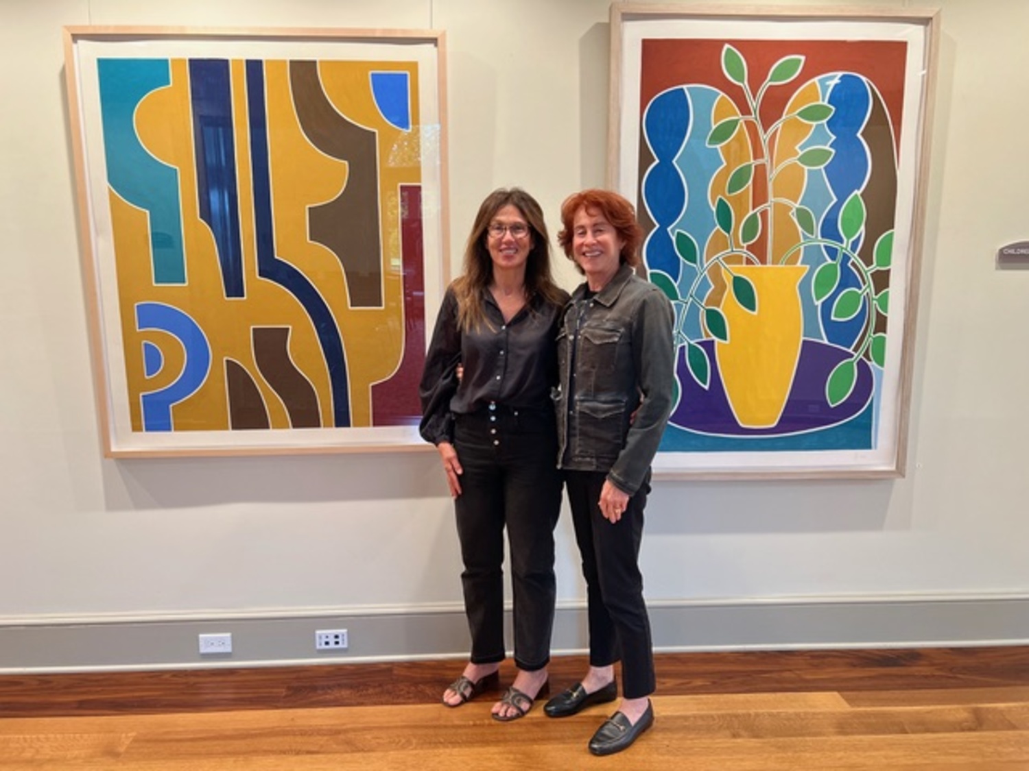 An opening reception and artists talk for a new exhibition of work by Patricia Udell, left,  opened recently at the Quogue Library.  Sue Zamkow was among those who attended and met the artist. COURTESY QUOGUE LIBRARY