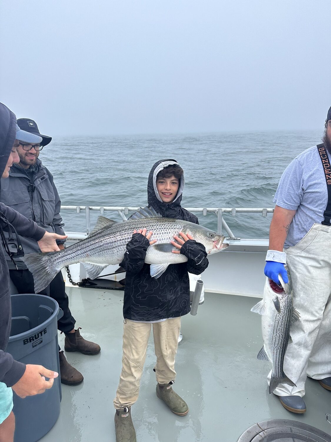 Balthi Estrella of Water Mill decked this big striper while fishing aboard Capt. Paul Bruno's charter boat Elizabeth II off Montauk on Father's Day. JUAN ESTRELLA