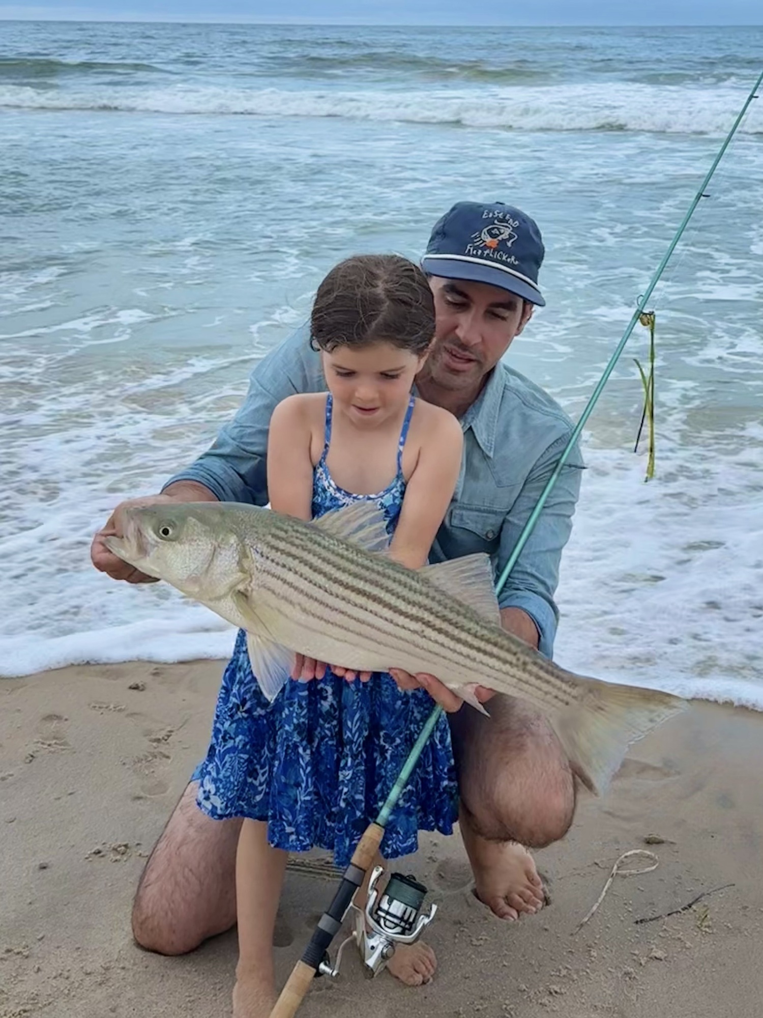 The Sagg Main drum circle turned into a fishing expedition for Stephen and Delfina Lobosco on Monday. JESSICA LOBOSCO