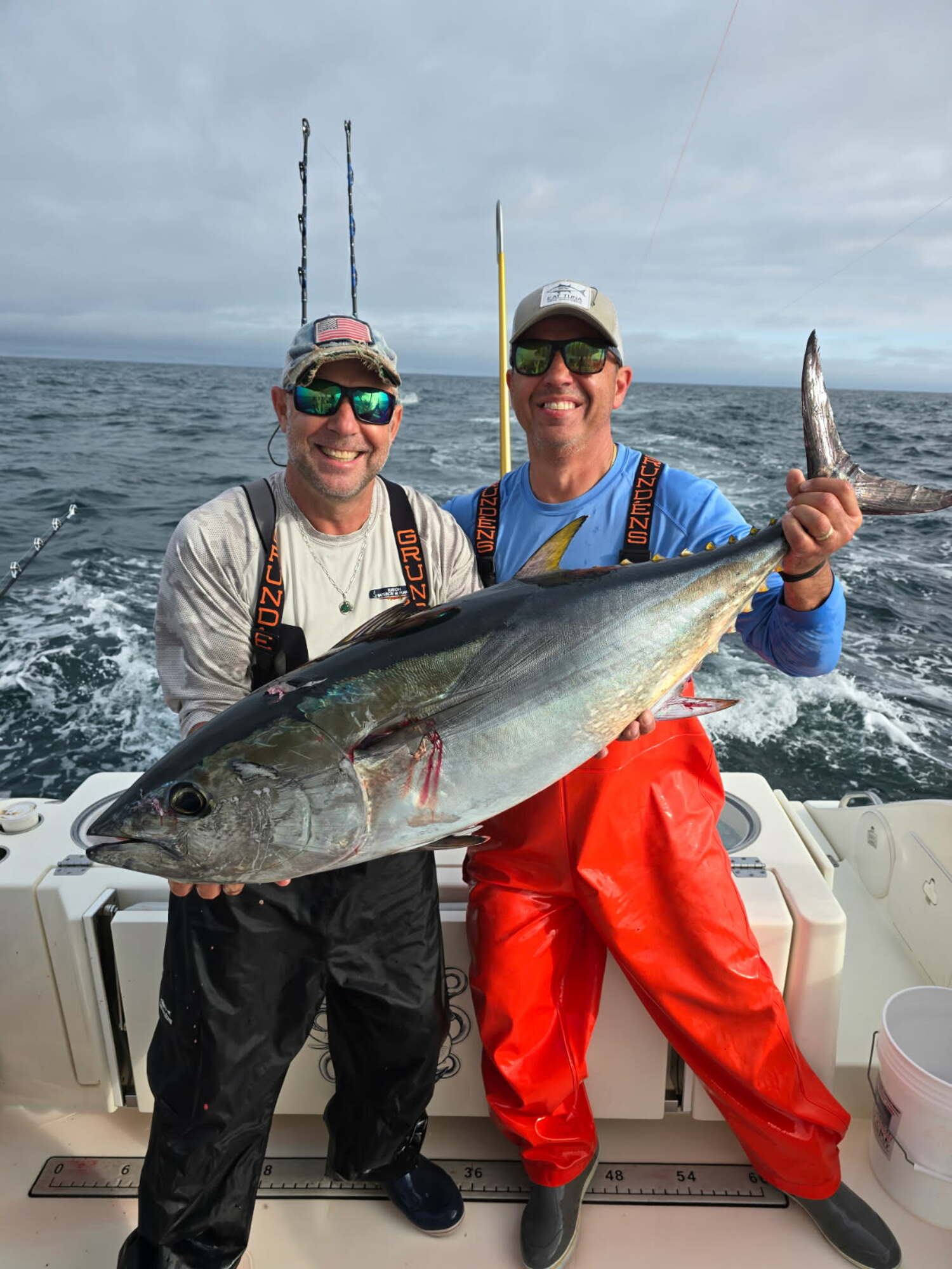 The tuna fishing continues to be red hot close to shore. Rick Nydegger, left, and Greg Sikorsky were out on the grounds aboard Capt. Shay Lohr's boat Deep Six out of Hampton Bays and boated this bluefin. SHAY LOHR