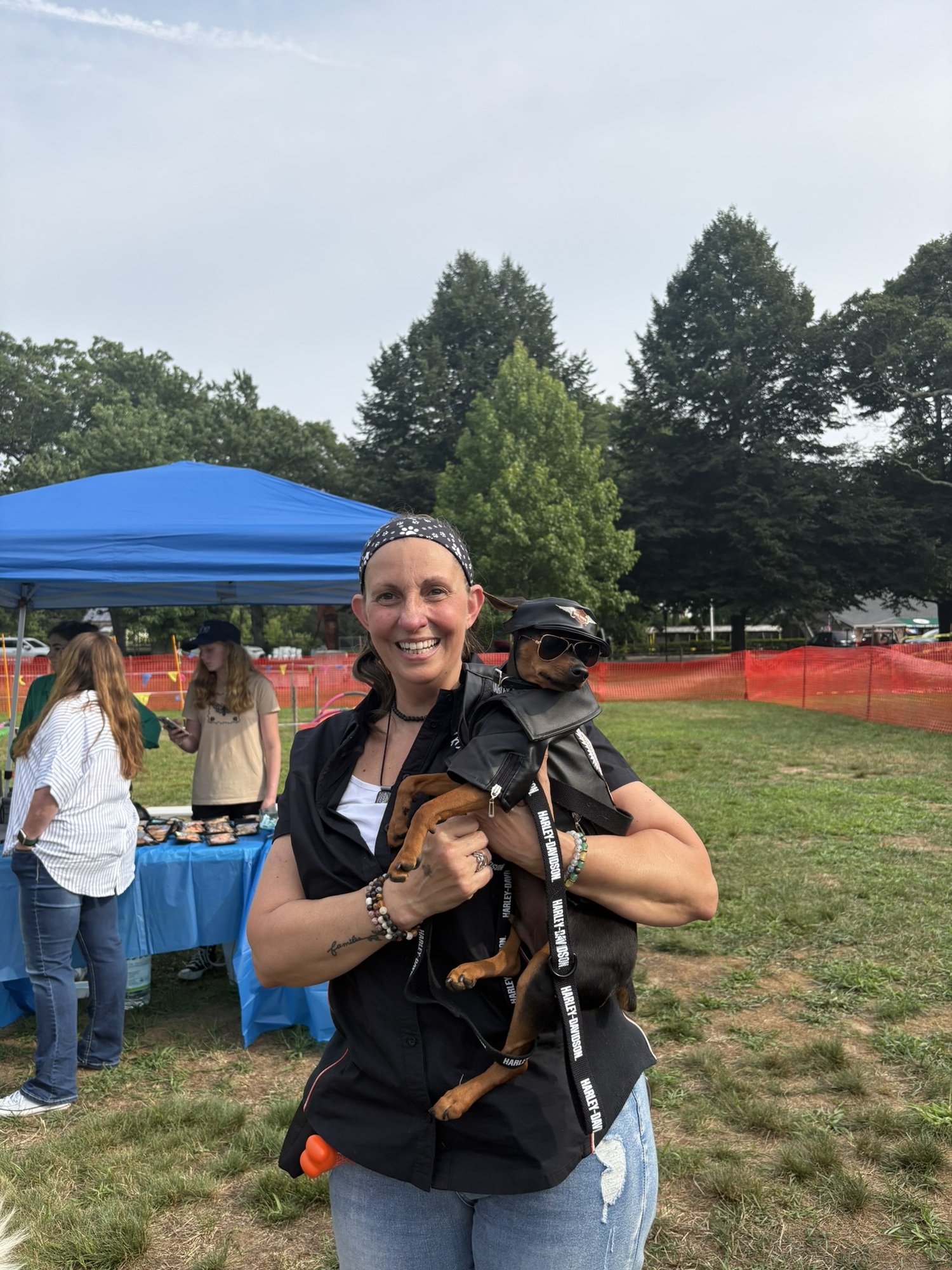 Fang, a 10-month-old miniature pinscher dressed as a biker, competes in the Owner-Dog Look-Alike contest with his owner, Amanda, and placed third. Georgia Kenny photo