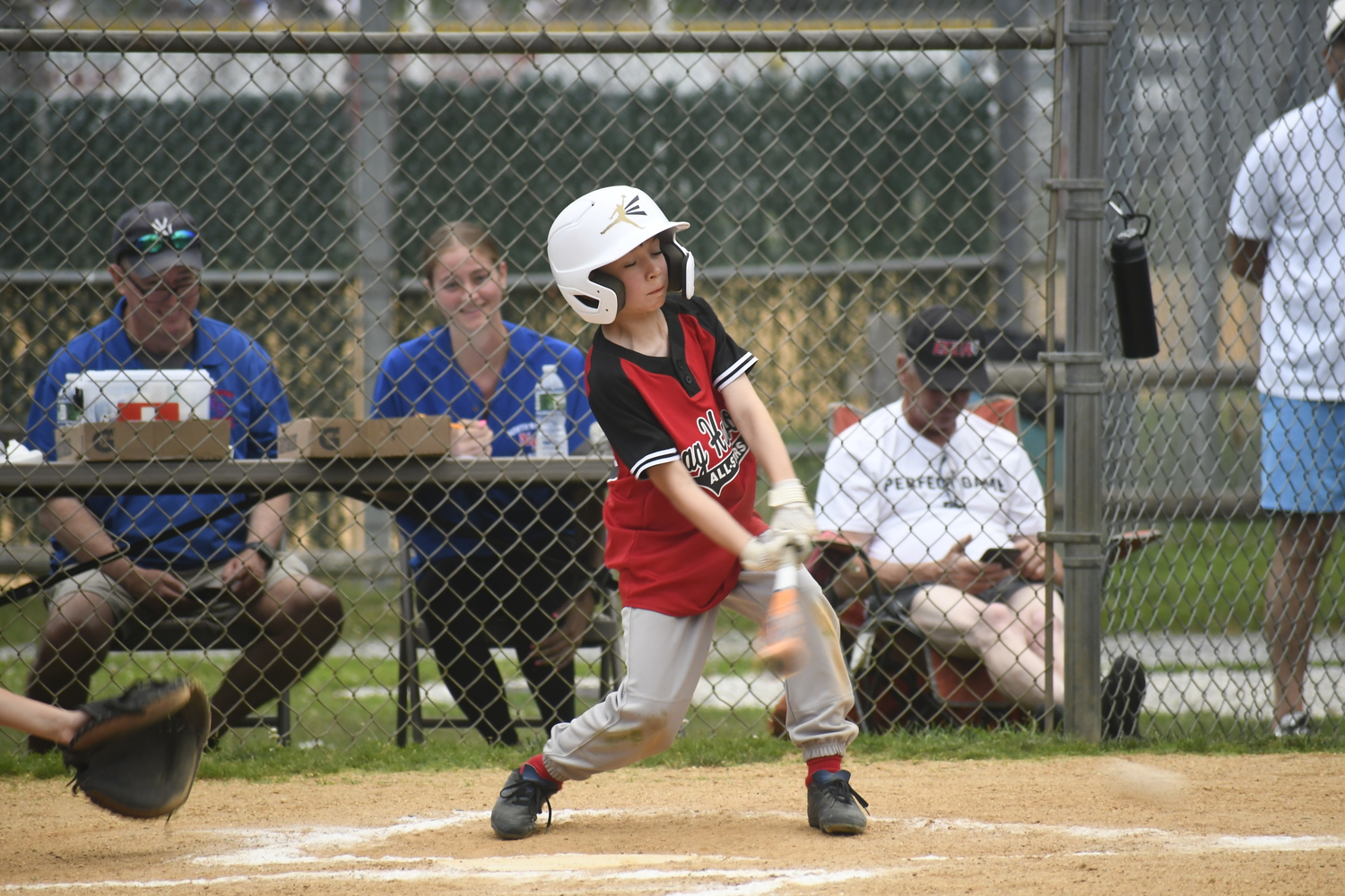 Aleksei Darvin puts a ball in play.  DREW BUDD