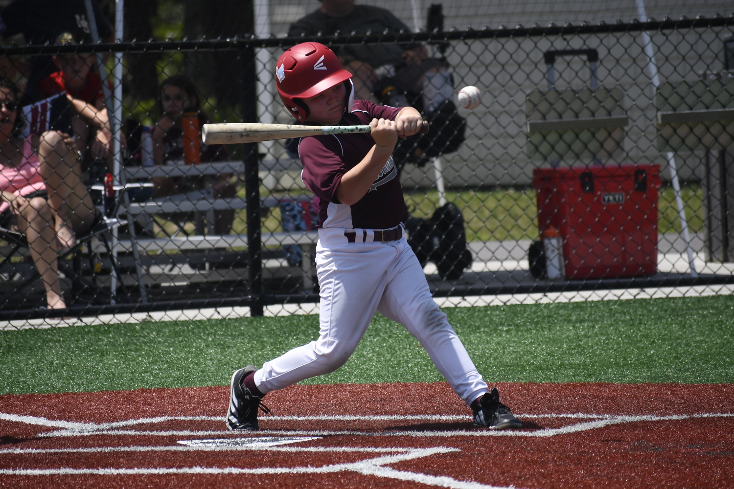 Ryder Abran puts the ball in play.  DREW BUDD