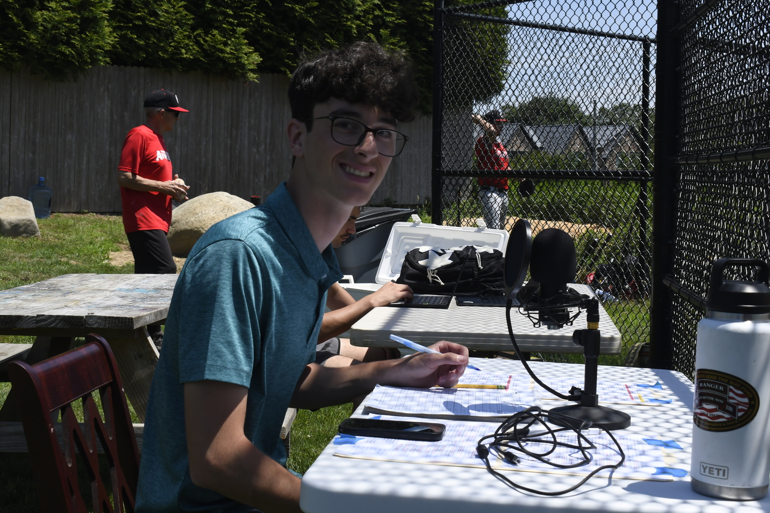 Roman Brunetti, 17, of Stewart Manor and a rising senior at Chaminade High School is one of the current broadcasters for the HCBL.  DREW BUDD