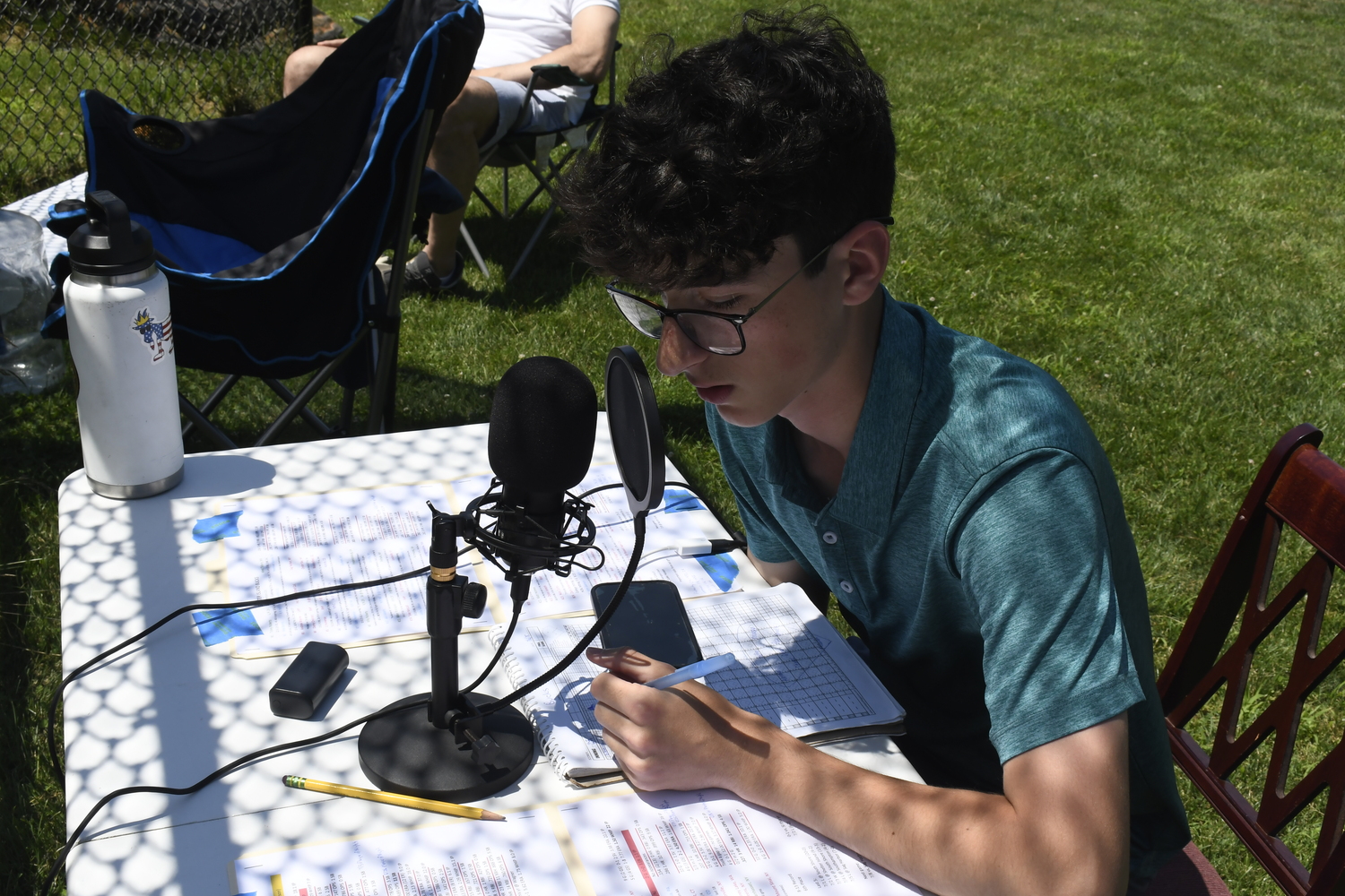 Roman Brunetti, 17, of Stewart Manor and a rising senior at Chaminade High School is one of the current broadcasters for the HCBL.  DREW BUDD