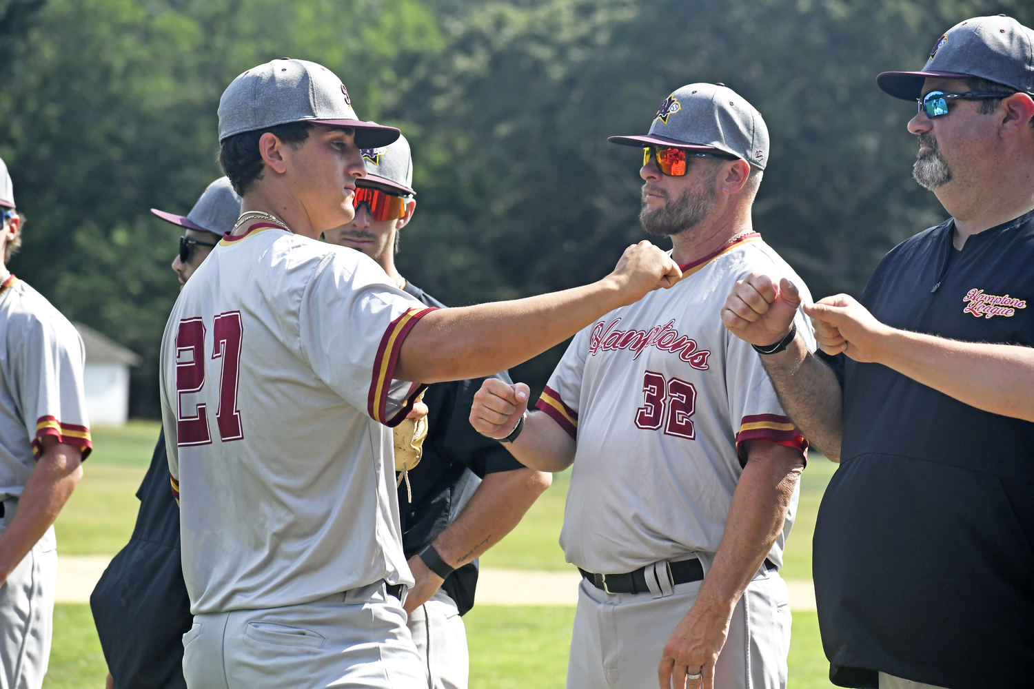 Southampton Breaker Collin Quintano greets his manager Rob Cafiero during the pregame ceremony.  DREW BUDD