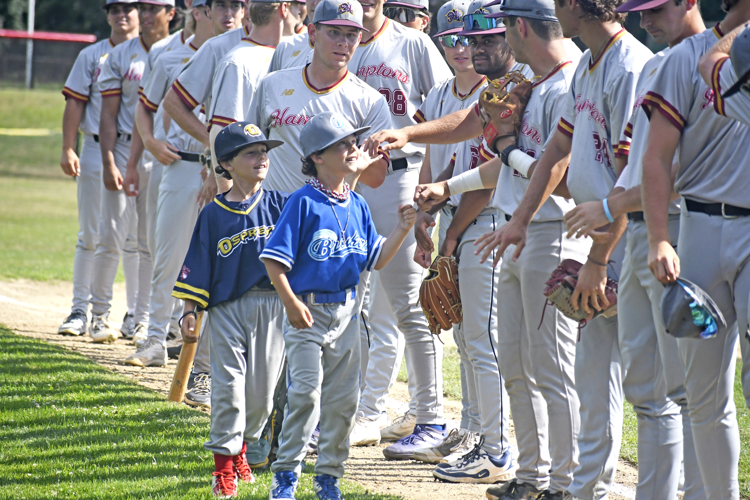 The bat boys are introduced.  DREW BUDD