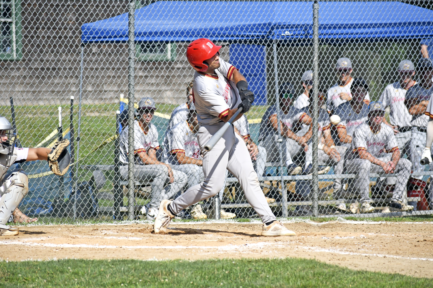 Mikey Brunetti (Westhampton/Bradley) offers at a pitch but flies out to the outfield.  DREW BUDD