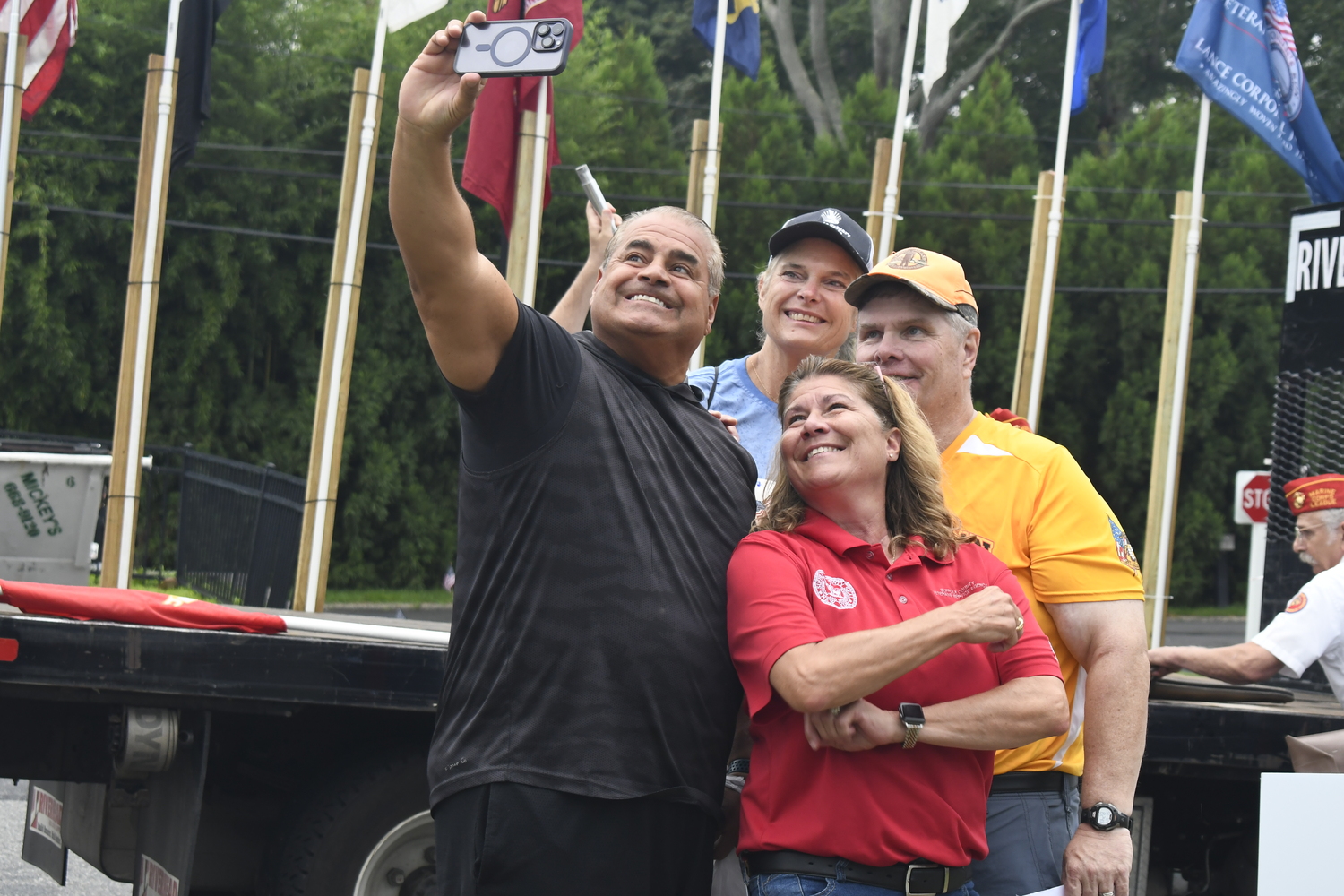 Suffolk County Legislator Nick Caracappa known for taking his selfies, takes one with fellow Suffolk County Legislator Ann Welker,  and .  DREW BUDD