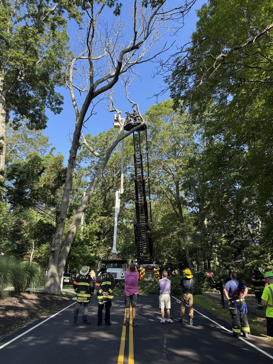 Wednesday, July 16, was a busy day for East Hampton firefighters. At the start of the day, around 8 a.m., East Hampton Fire Department rescued a town maintenance worker stuck in a bucket truck. The firefighters brought the man back down to ground safely.