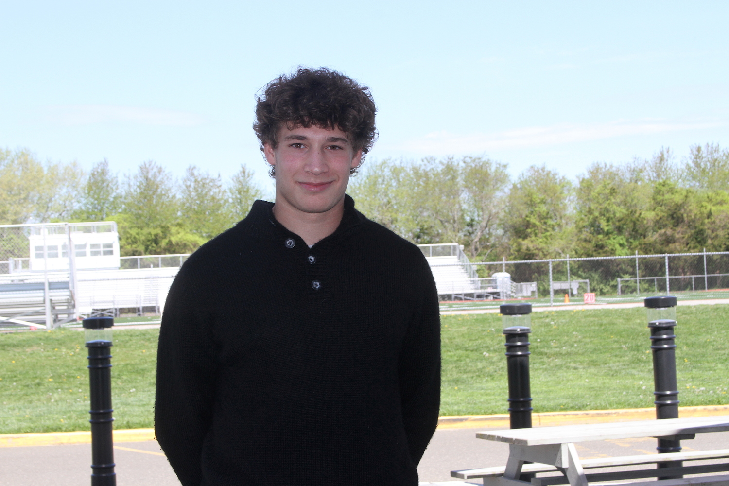 East Hampton junior Charlie Stern on the new high school cafeteria patio. DESIRÉE KEEGAN