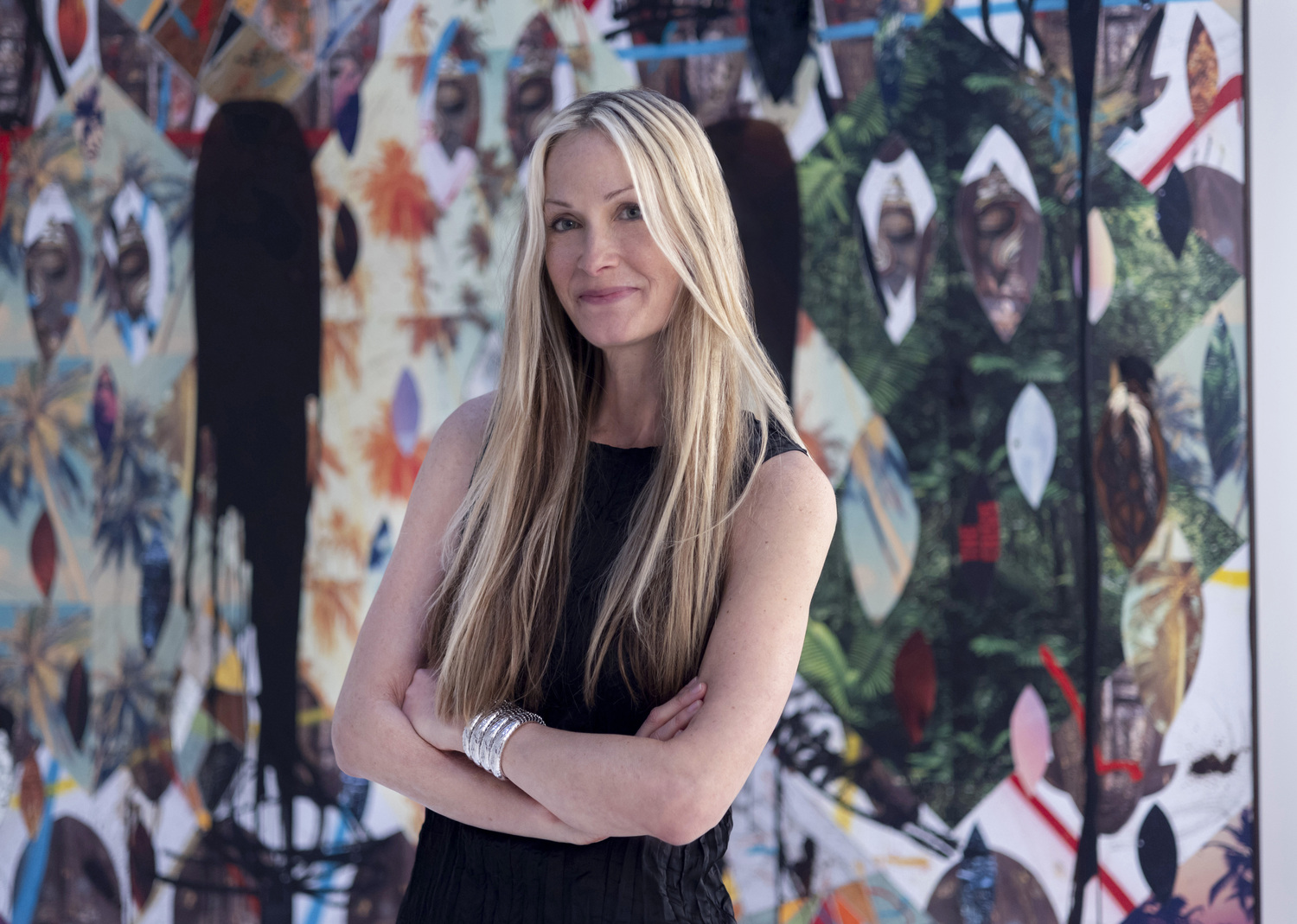 Christine Mack with a painting by Rashid Johnson behind her. PONTUS HOOK.