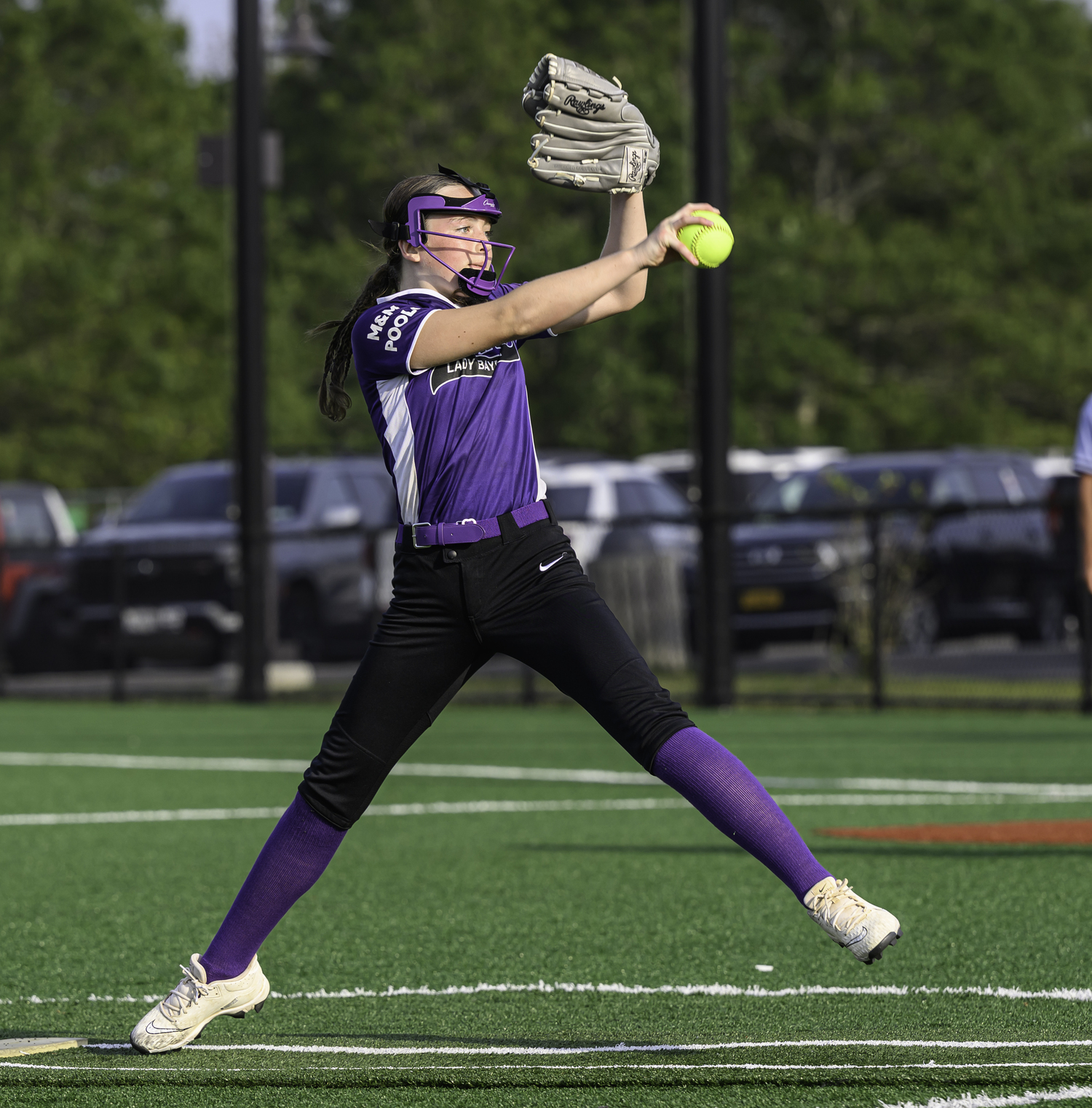 Isla McMahon deals to the plate.  MARIANNE BARNETT