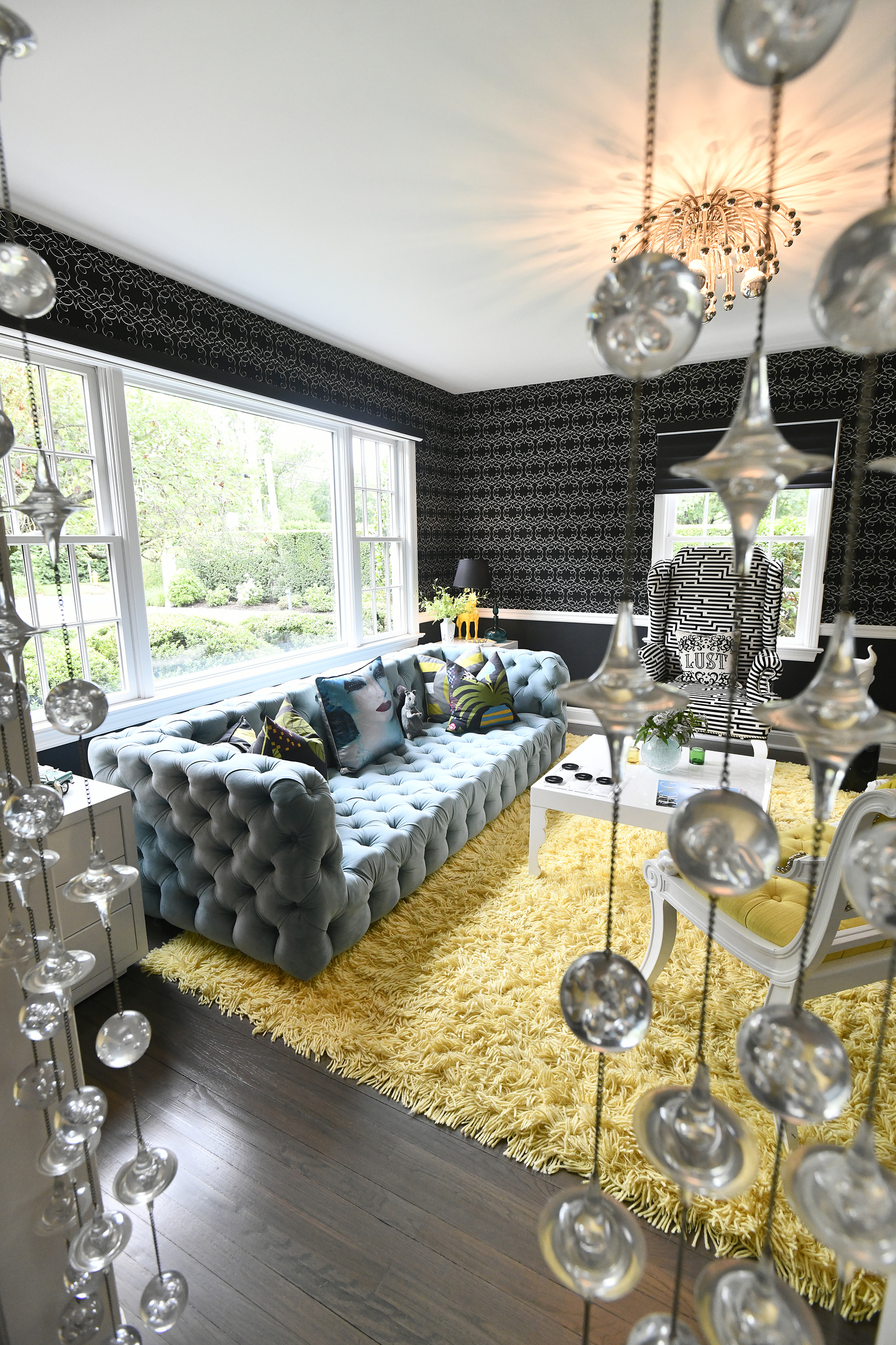 The entrance to the study features mid-century, lucite bobble screen.  DANA SHAW