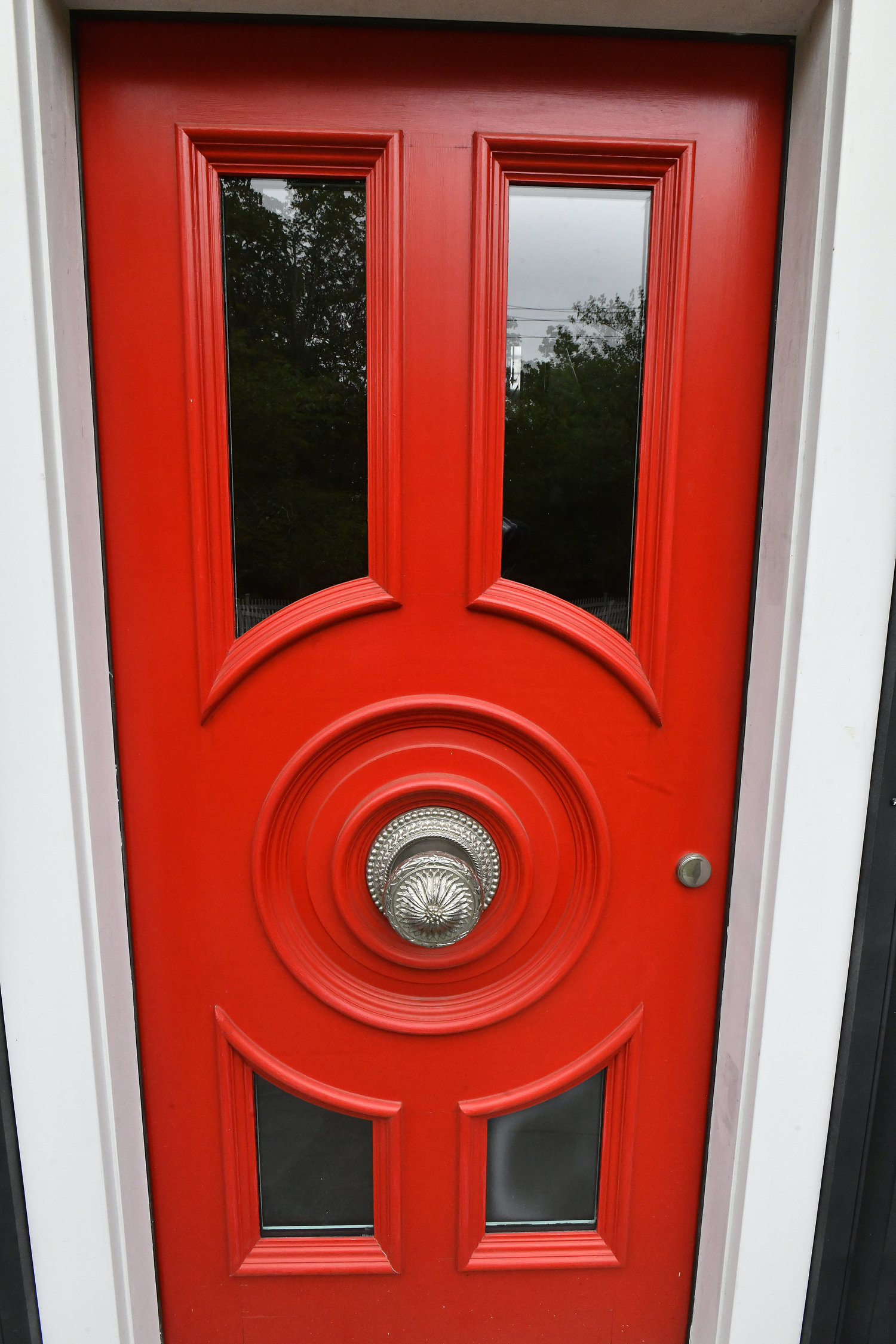 The custom front door and doorknob.  DANA SHAW
