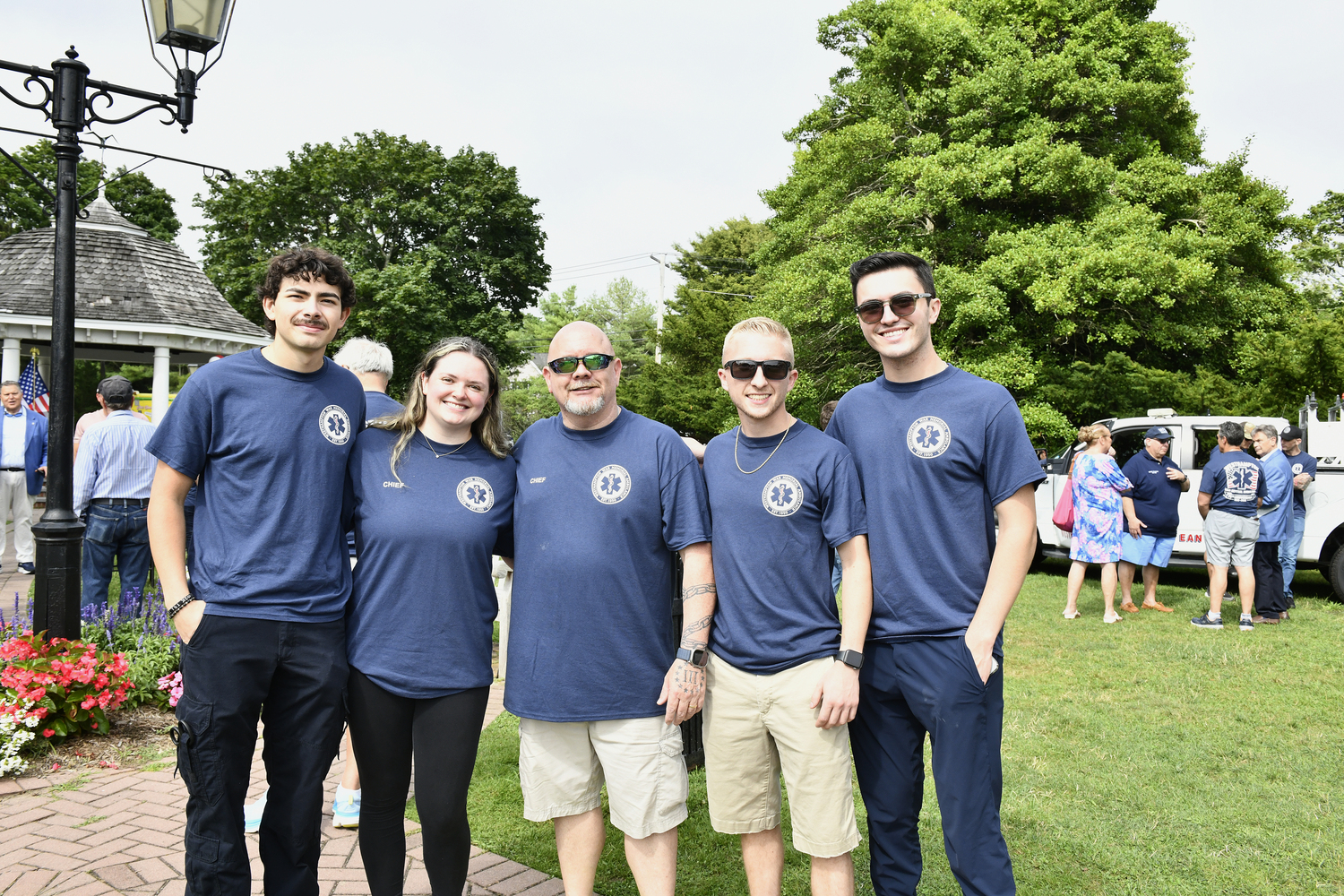 Conner Puch, First Assistant Chief Alison Davis, Chief Robert Bancroft, Jeff Litzko and Michael Morrell at the celebration of the  Westhampton War Memorial Ambulance' 75th anniversary on Saturday.  DANA SHAW .  DANA SHAW