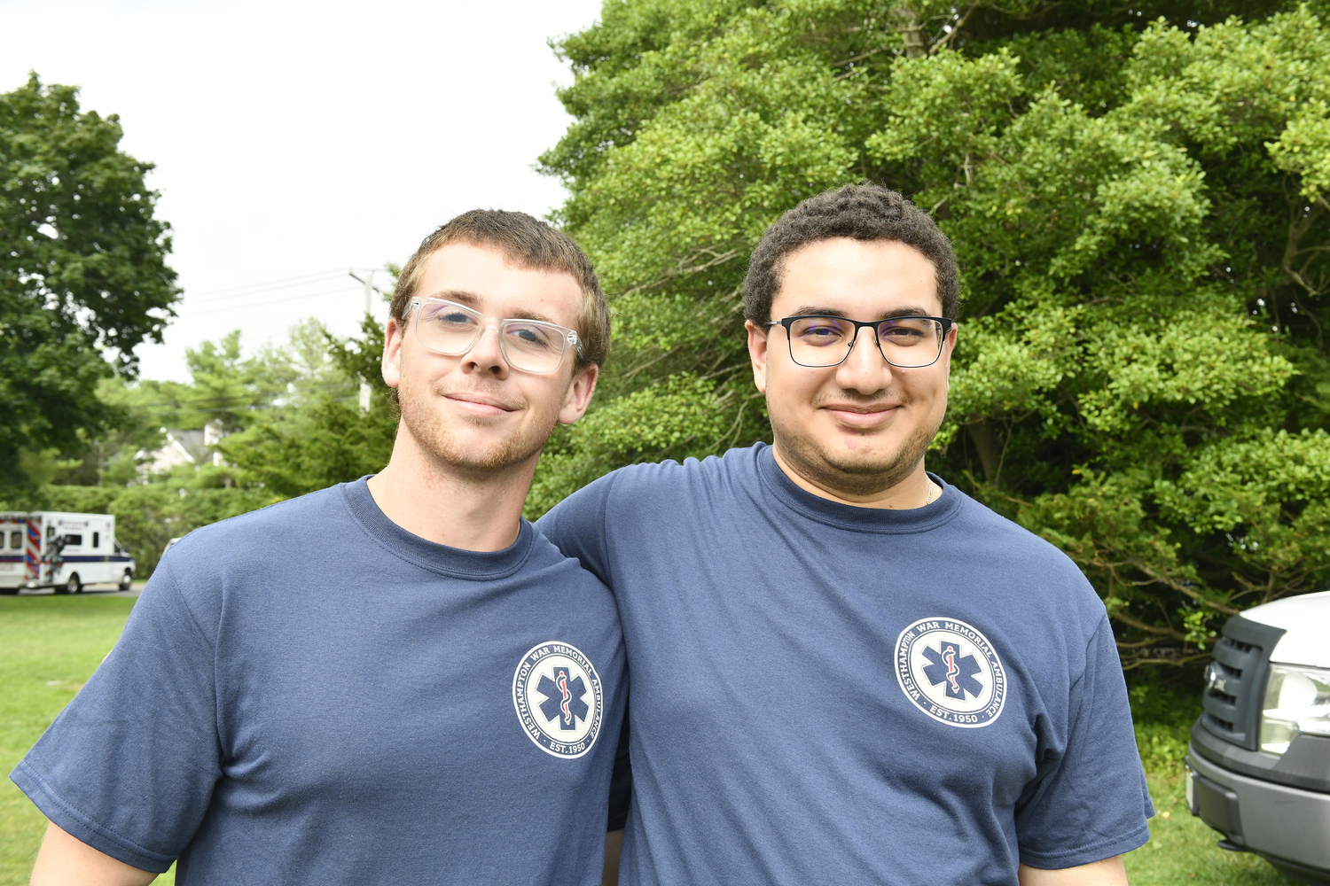 Liam Parsons and Ramiro Veliz at the celebration of the Westhampton War Memorial Ambulance' 75th anniversary on Saturday.  DANA SHAW