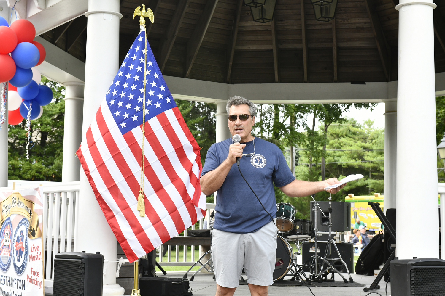 Chris Isola, Westhampton War Memorial Ambulance Association 40-year-plus member and Police Chief of Quogue Village speaks at the Westhampton War Memorial Ambulance' 75th anniversary on Saturday.  DANA SHAW