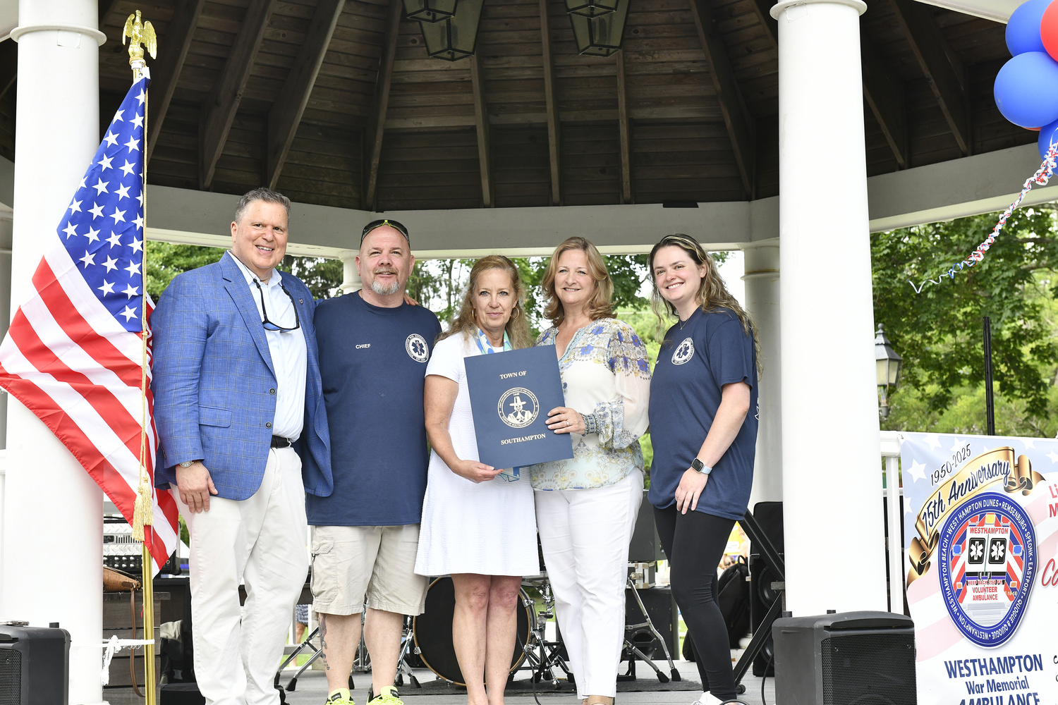 Craig Ferrantino, Chief Robert Bancroft, Southampton Town Clerk Sundy . Schermeyer, Town Supervisor Maria Moore and  First Assistant Chief Alison Davis with a proclamation from the town.  DANA SHAW