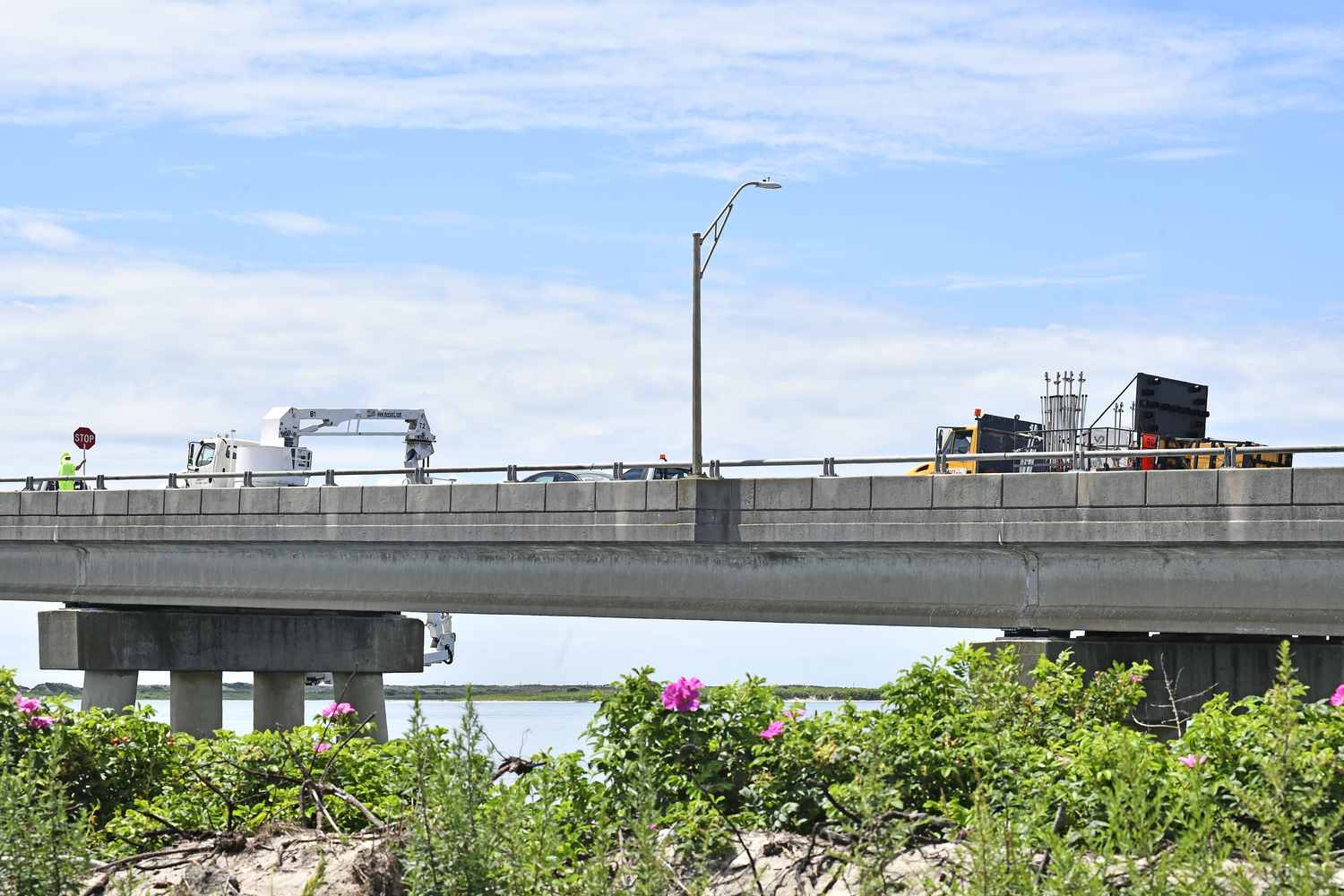 Engineers working for the Suffolk County Department of Public Works conduct a more forensic assessment on the Ponquogue Bridge on Tuesday. DANA SHAW