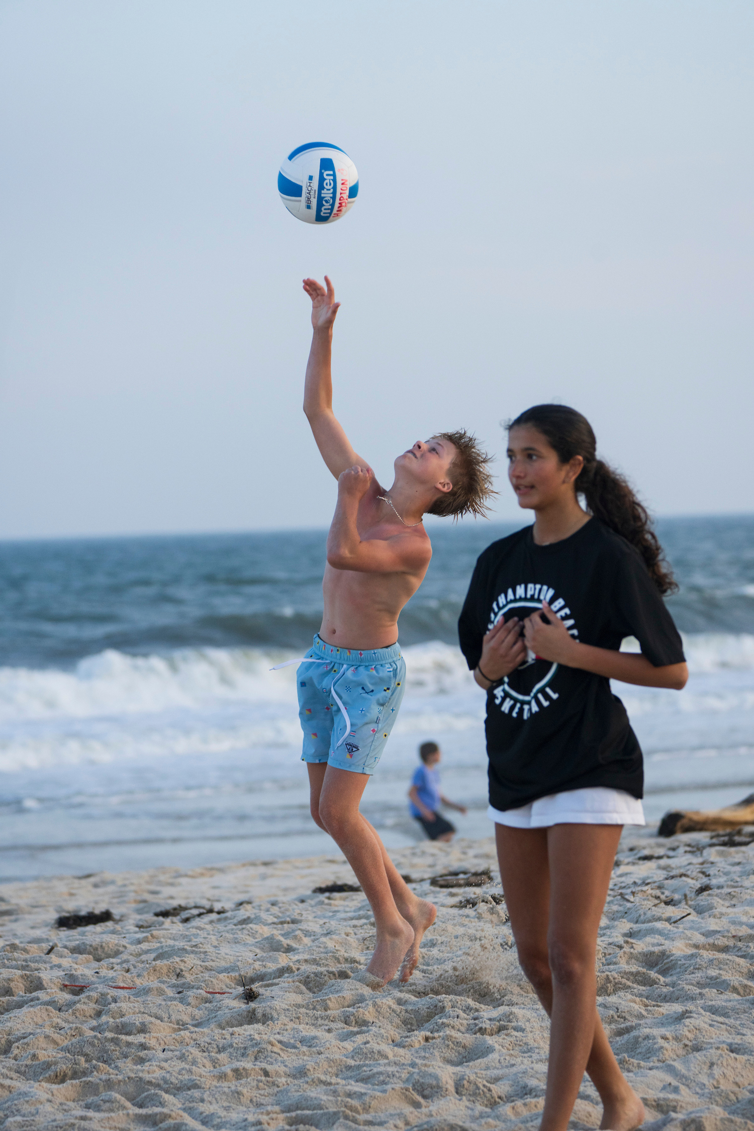 The 12 volleyball courts at Tiana Beach in Hampton Bays are packed on Tuesday and Thursday nights for leagues organized by East End Volleyball, which is on the cusp of its 50th anniversary. LORI HAWKINS