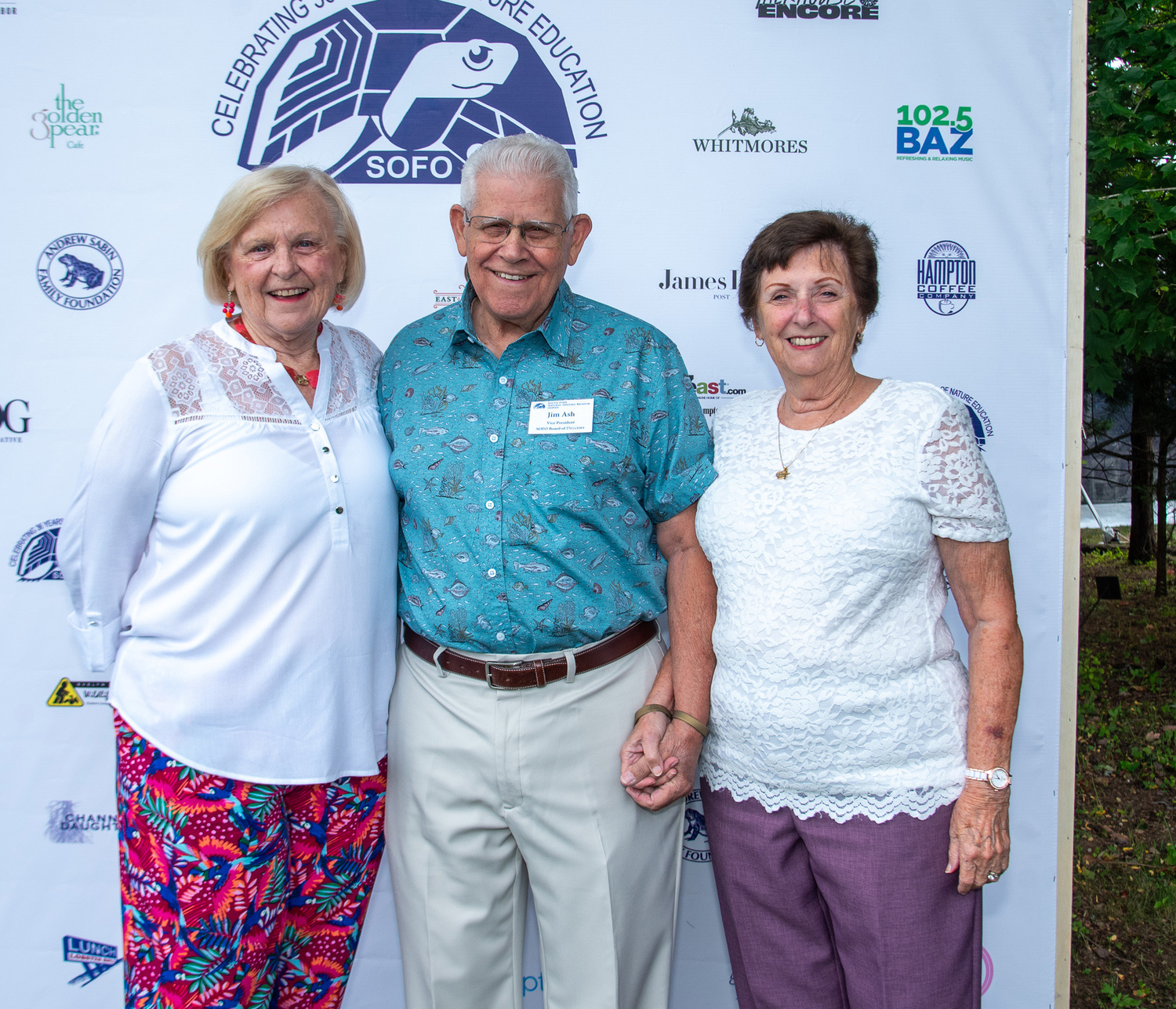 Pam and Jim Ash with Kathy Dombro at the South Fork North Fork Natural History Museum's (SOFO) 36th annual summer gala on Saturday evening in Bridgehampton.   LISA TAMBURINI