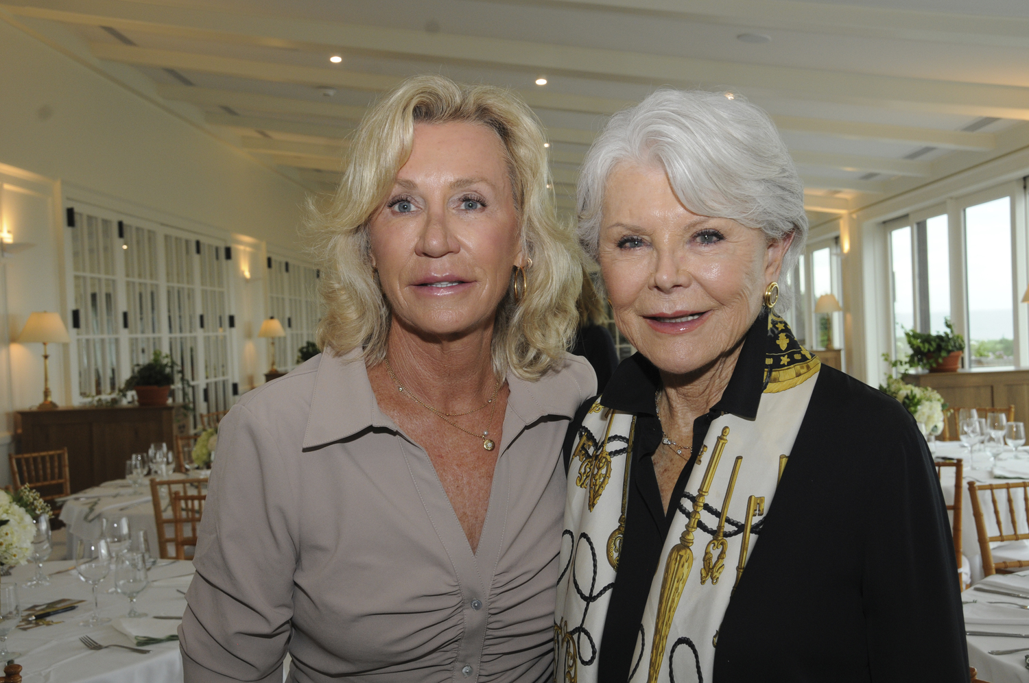 Hollis Forbes, luncheon co-chair and Nancy Stone at the Southampton Hospital Foundation’s 5th Annual Fundraising Luncheon on July 17 at the Maidstone Club. Guest Speaker Aerin Lauder spoke about the role that flowers have played in her family’s history and in her new book, “Living With Flowers.”    RICHARD LEWIN