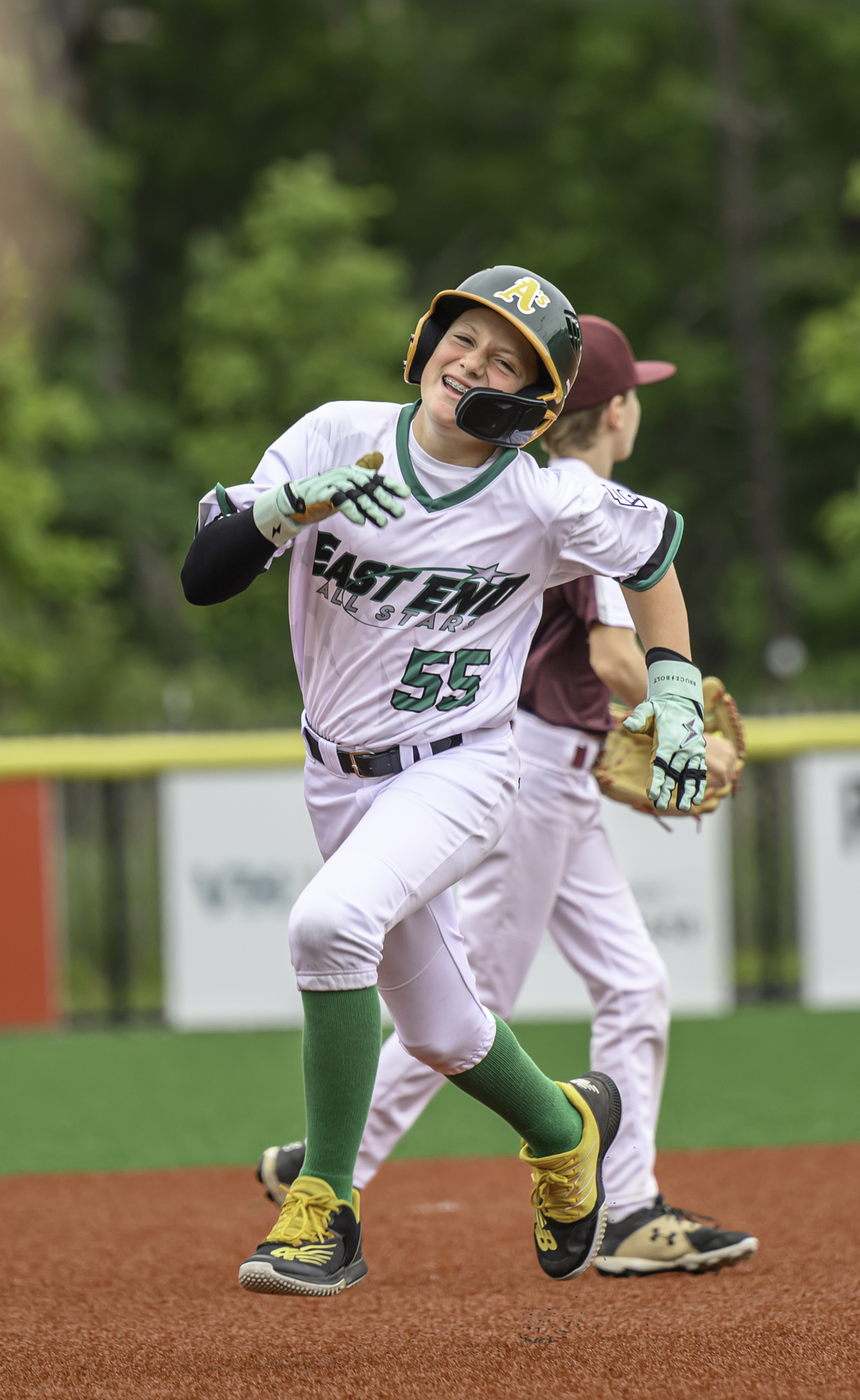 Ben Cariello hustles around the bases. MARIANNE BARNETT