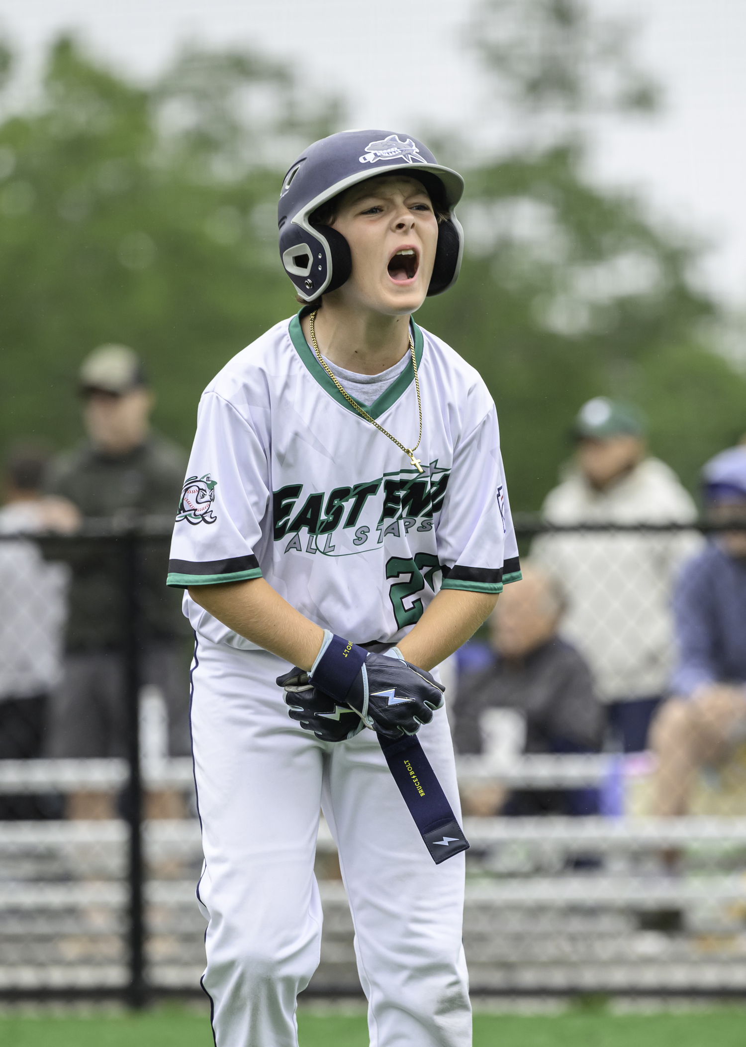 Kevin Kretz is pumped up after scoring a run.  MARIANNE BARNETT