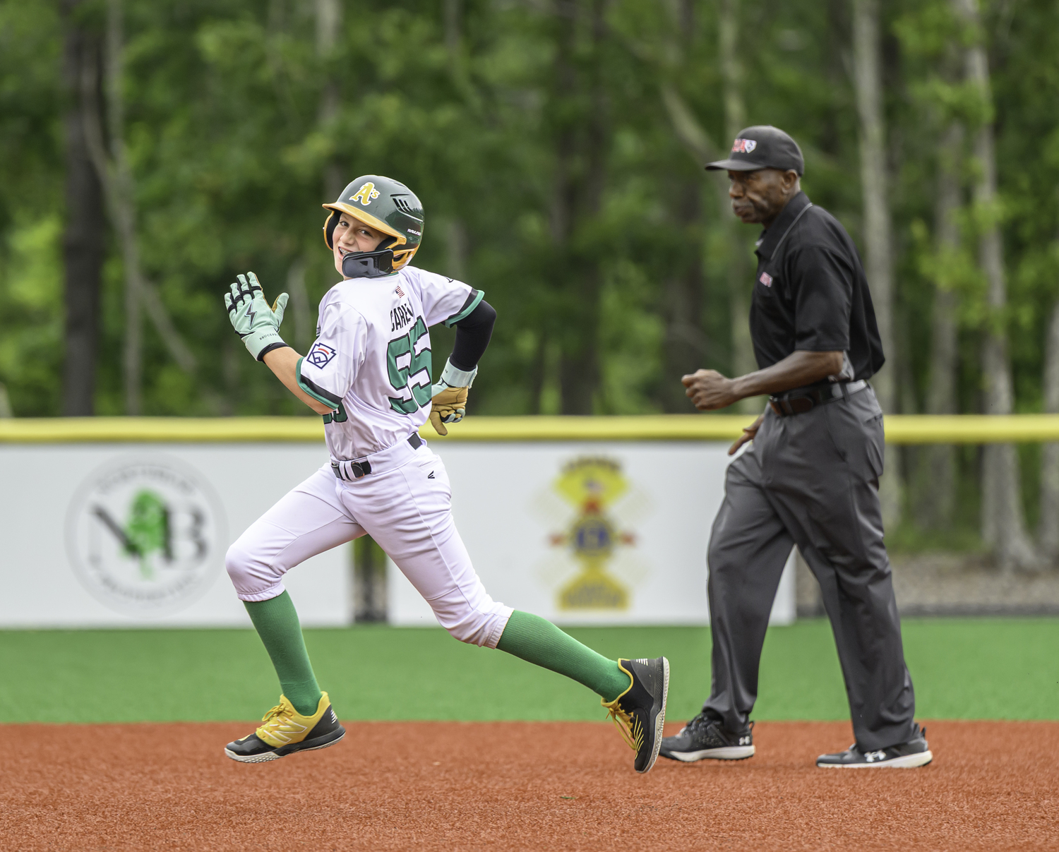 Ben Cariello hustles around the bases. MARIANNE BARNETT