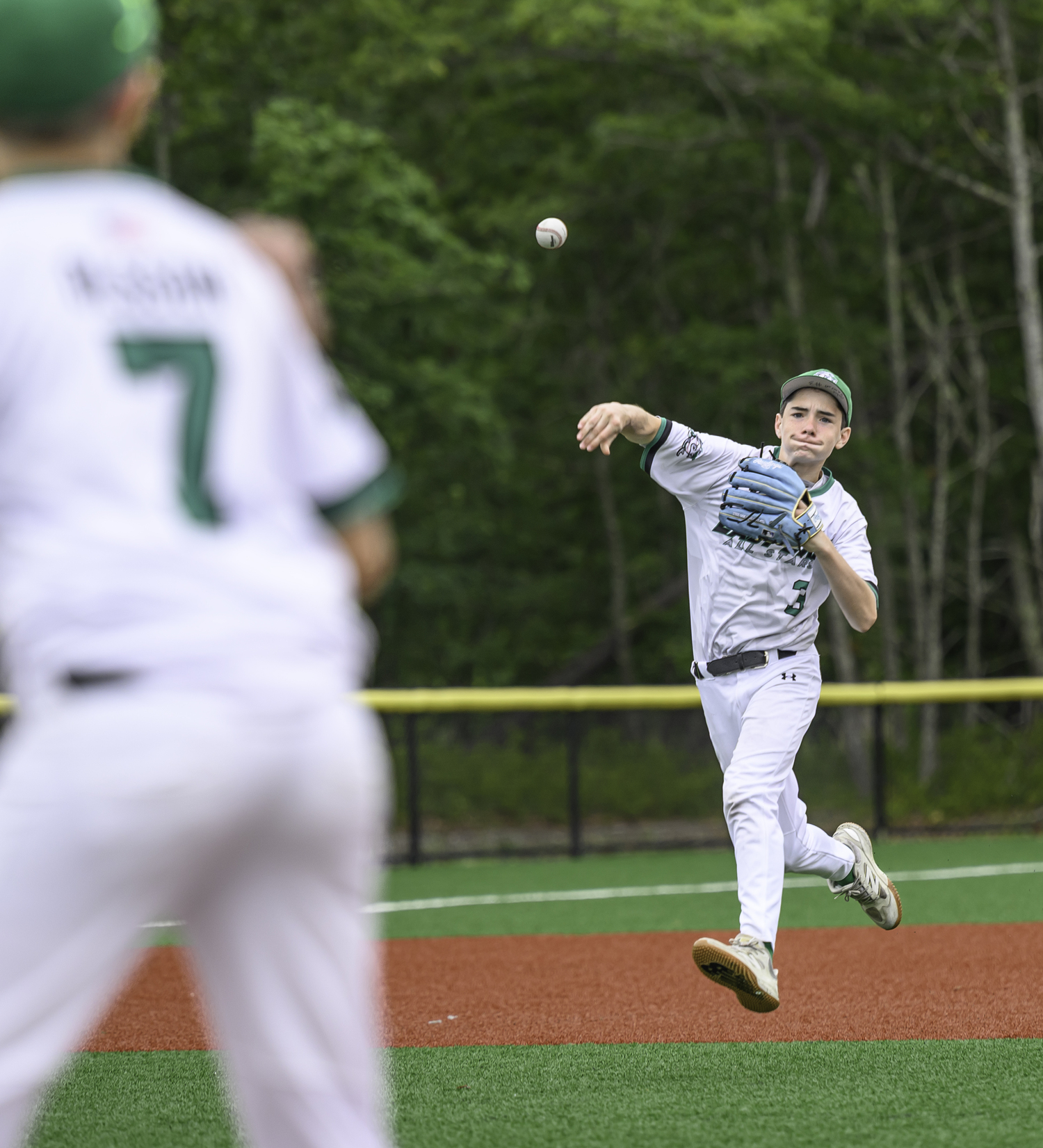 East End's Gabe Dawson fires over to first base.  MARIANNE BARNETT