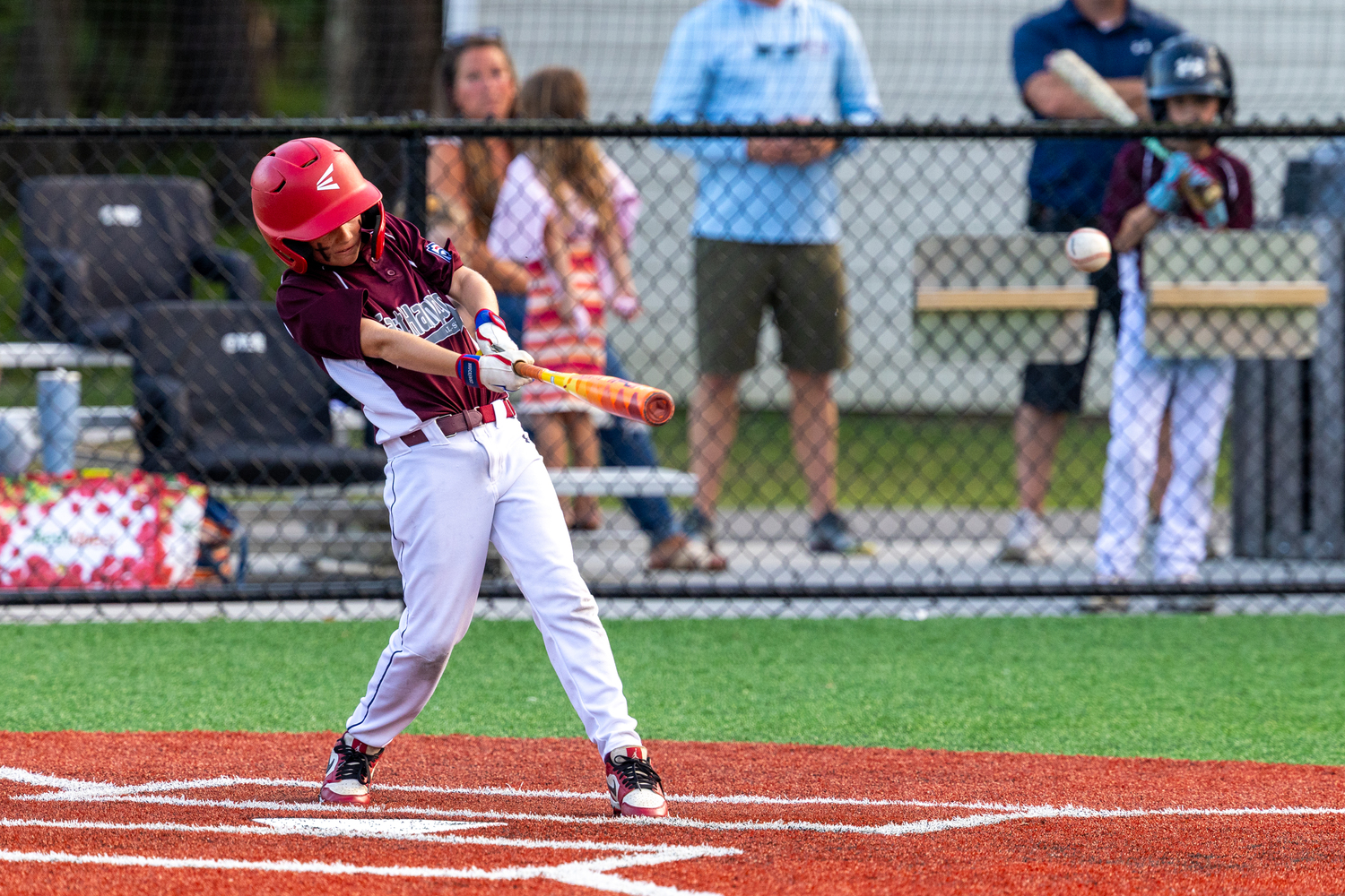 Colin Caulfield puts the ball in play.  RON ESPOSITO