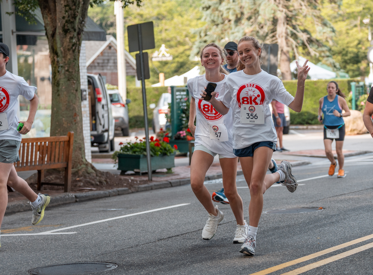 Shannon Walsh, left, and Anne Kenney at the start of Sunday morning's race.  RON ESPOSITO