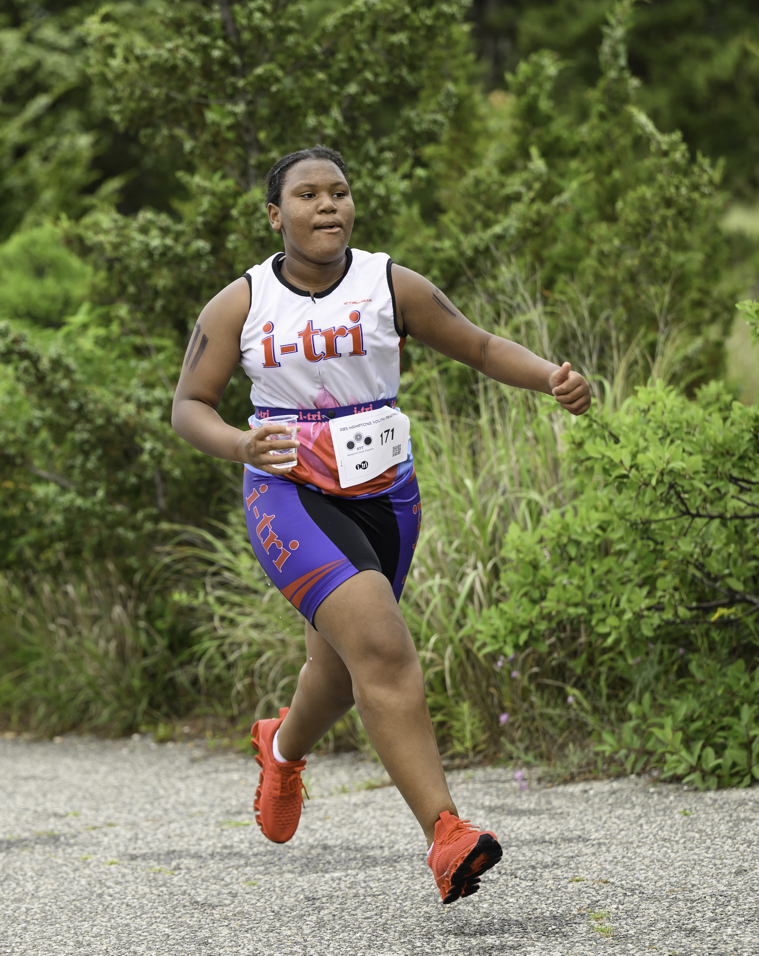 Najmah Sloan of Mastic Beach running along Long Beach.  MARIANNE BARNETT
