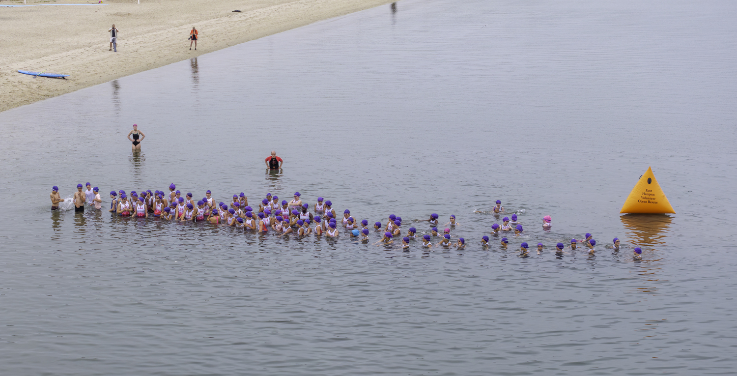 The i-Tri athletes are in the water.   MARIANNE BARNETT